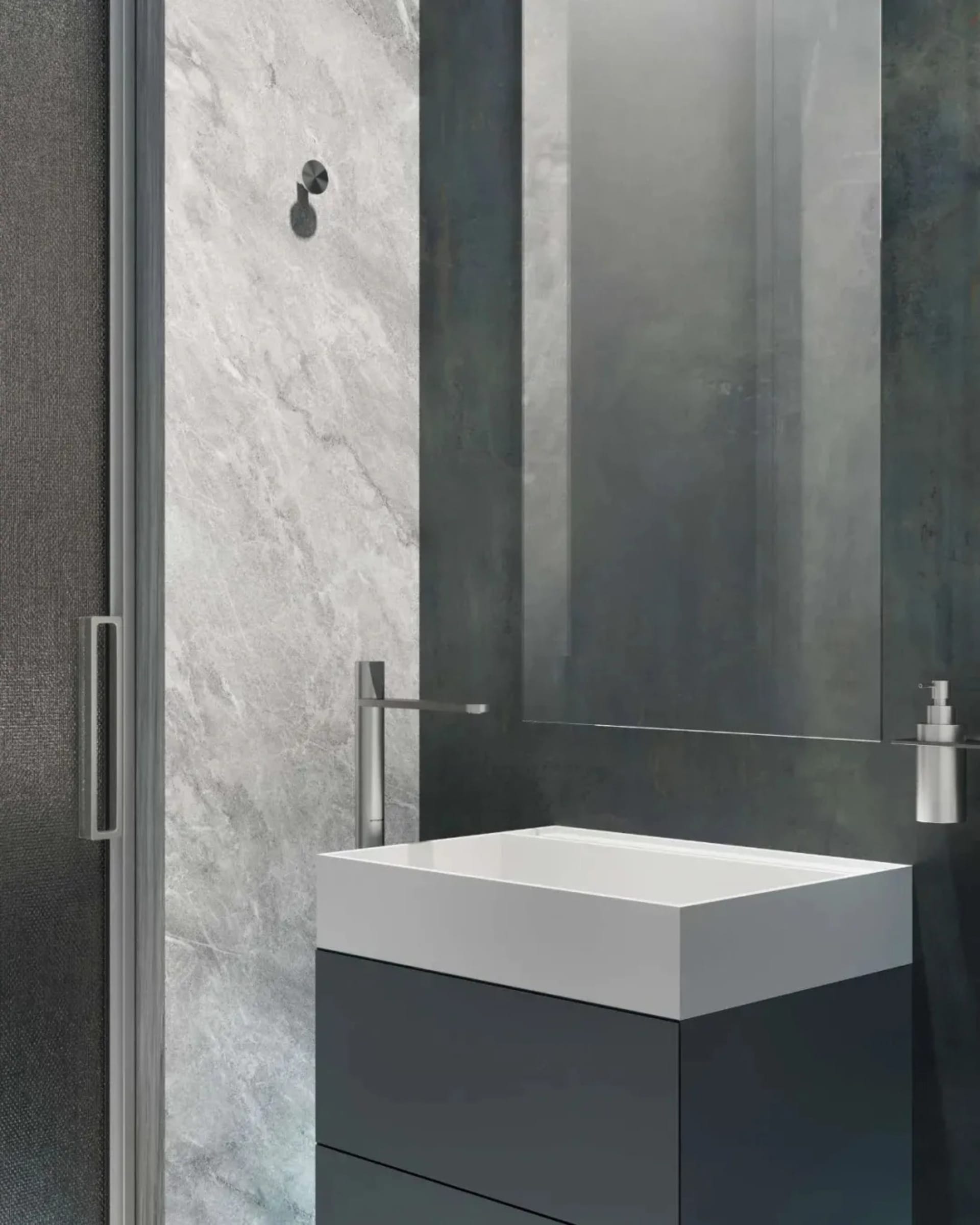 Industrial-style bathroom with metallic faucet, marble sink, and mirror.