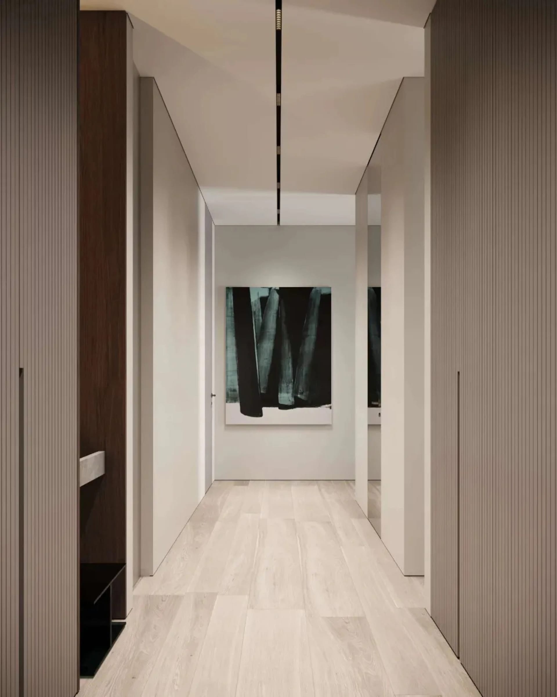 Modern corridor with white flooring and minimalist design.