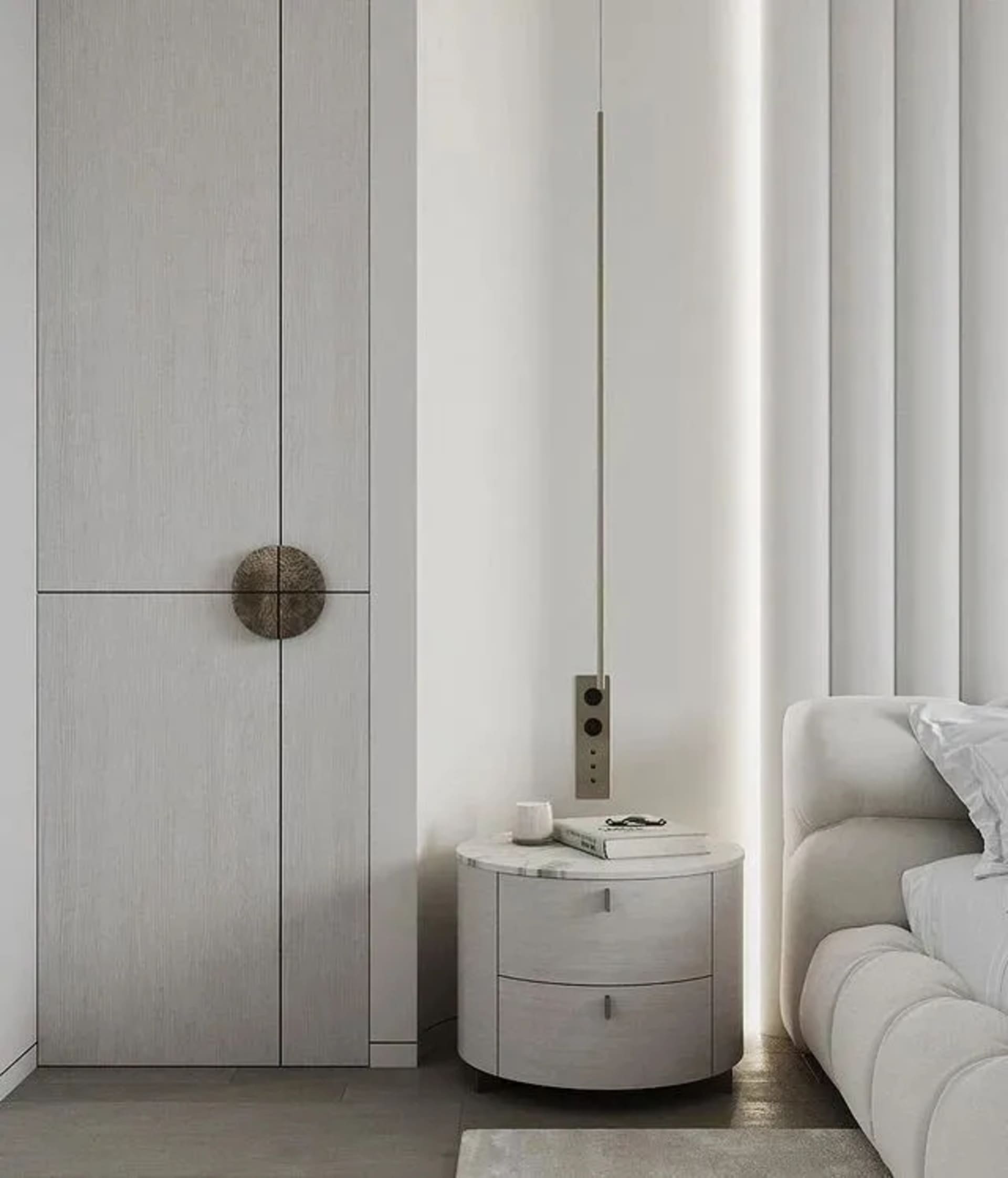 Modern minimalist bedroom featuring white materials, including a sleek round nightstand, a white sofa, and a large window wit