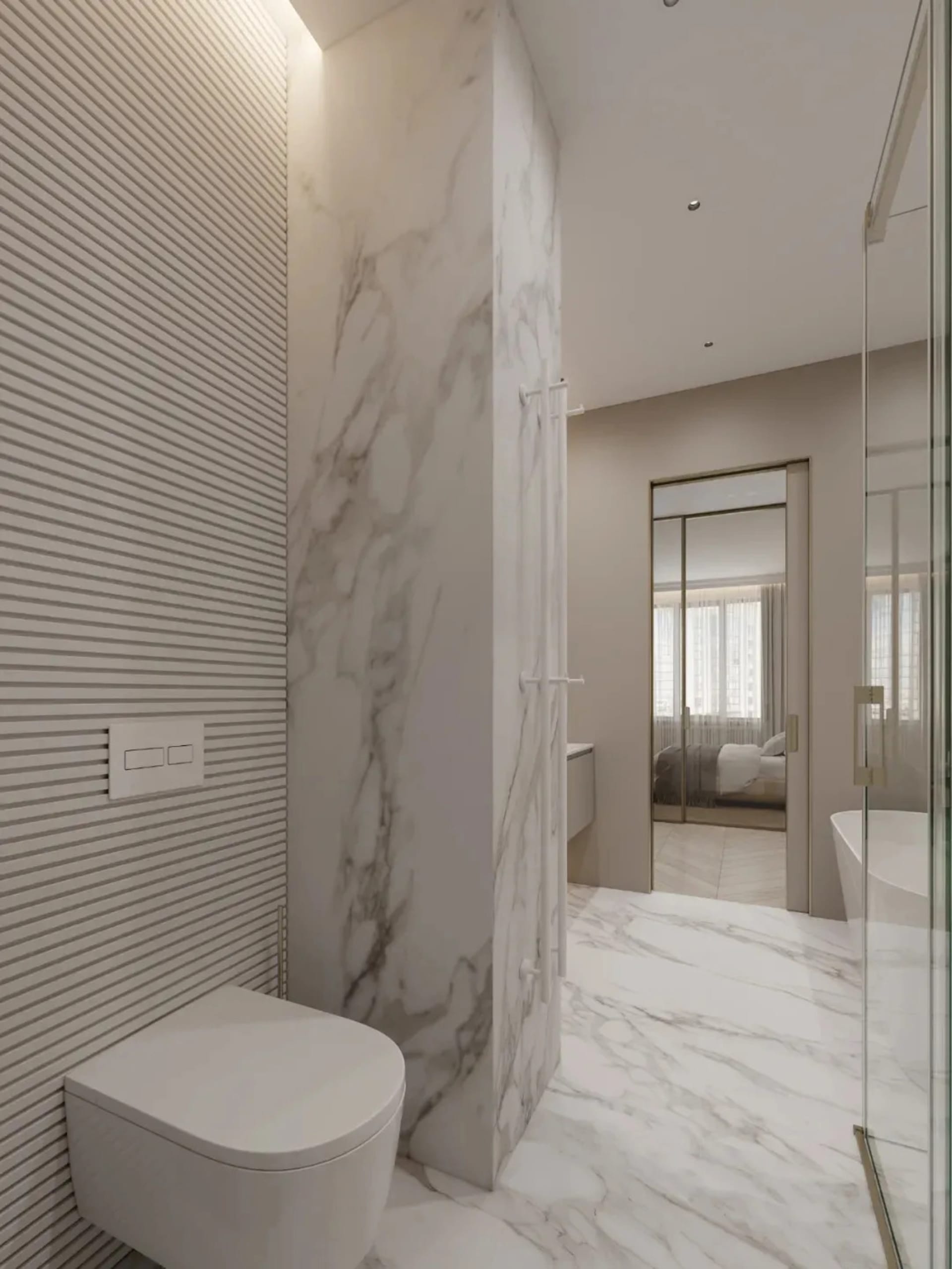 Modern bathroom featuring marble finishes and fixtures.