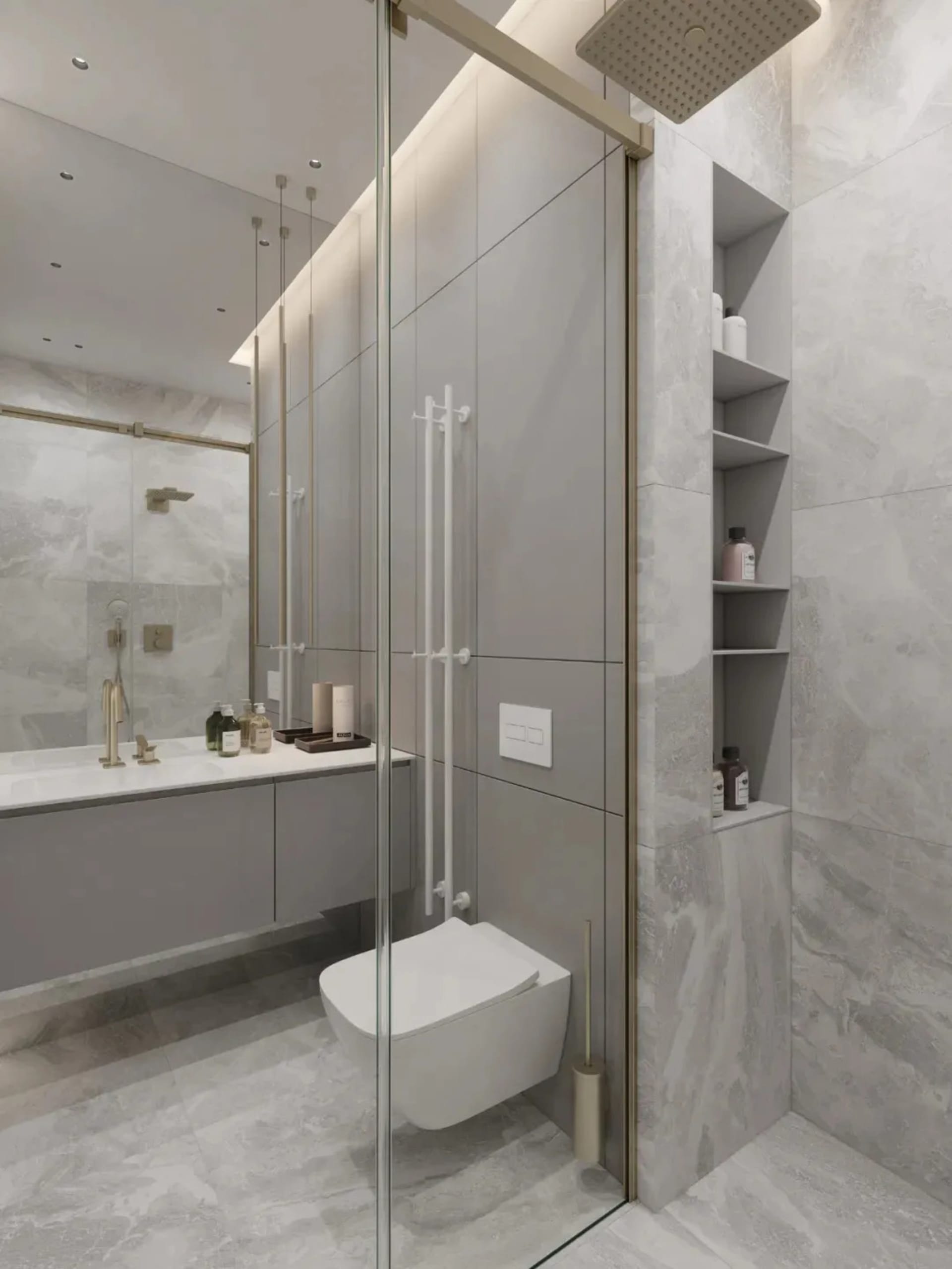 Modern bathroom with marble tiles, glass shower enclosure, and floating vanity