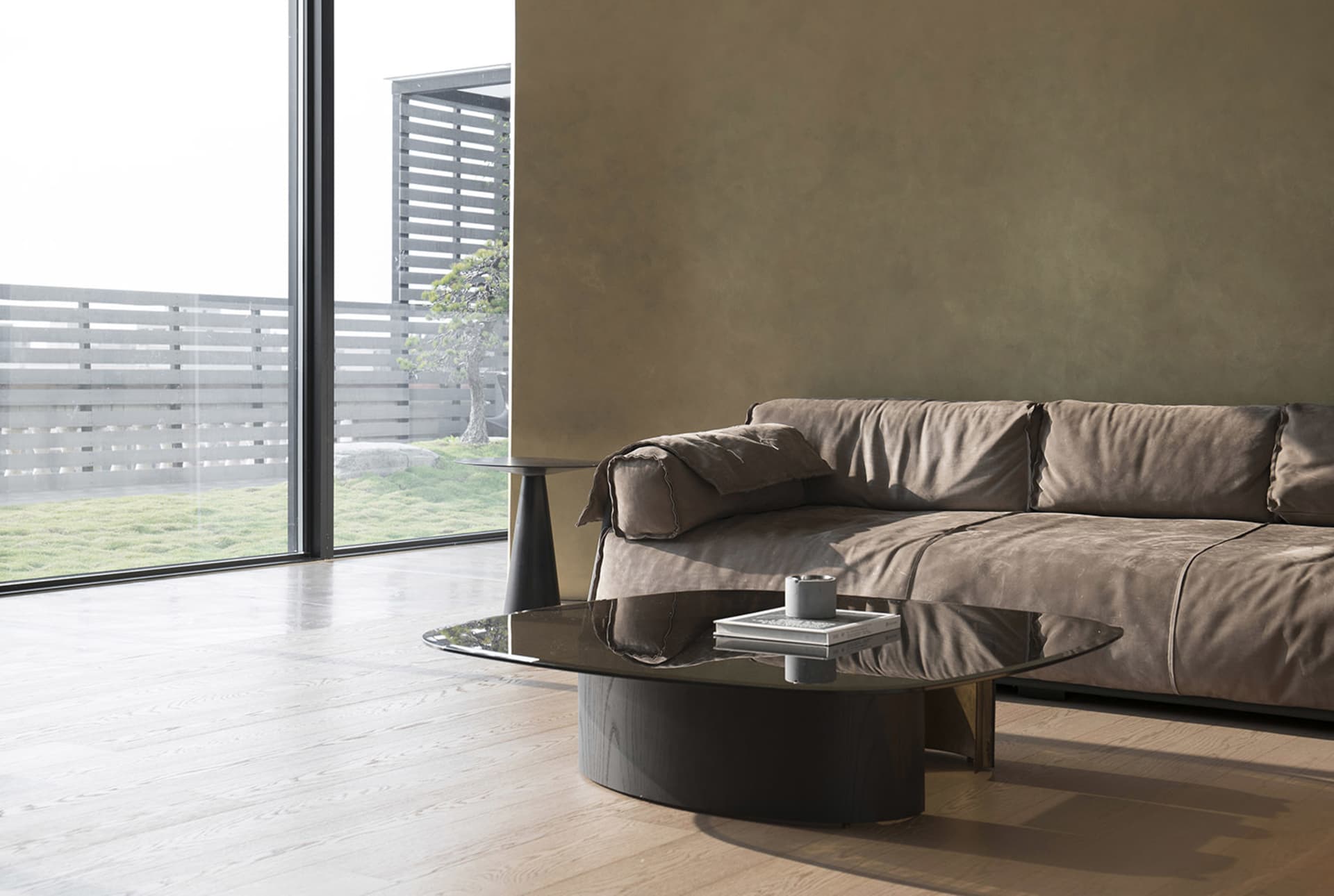 Modern living room featuring a brown sofa and glass coffee table.