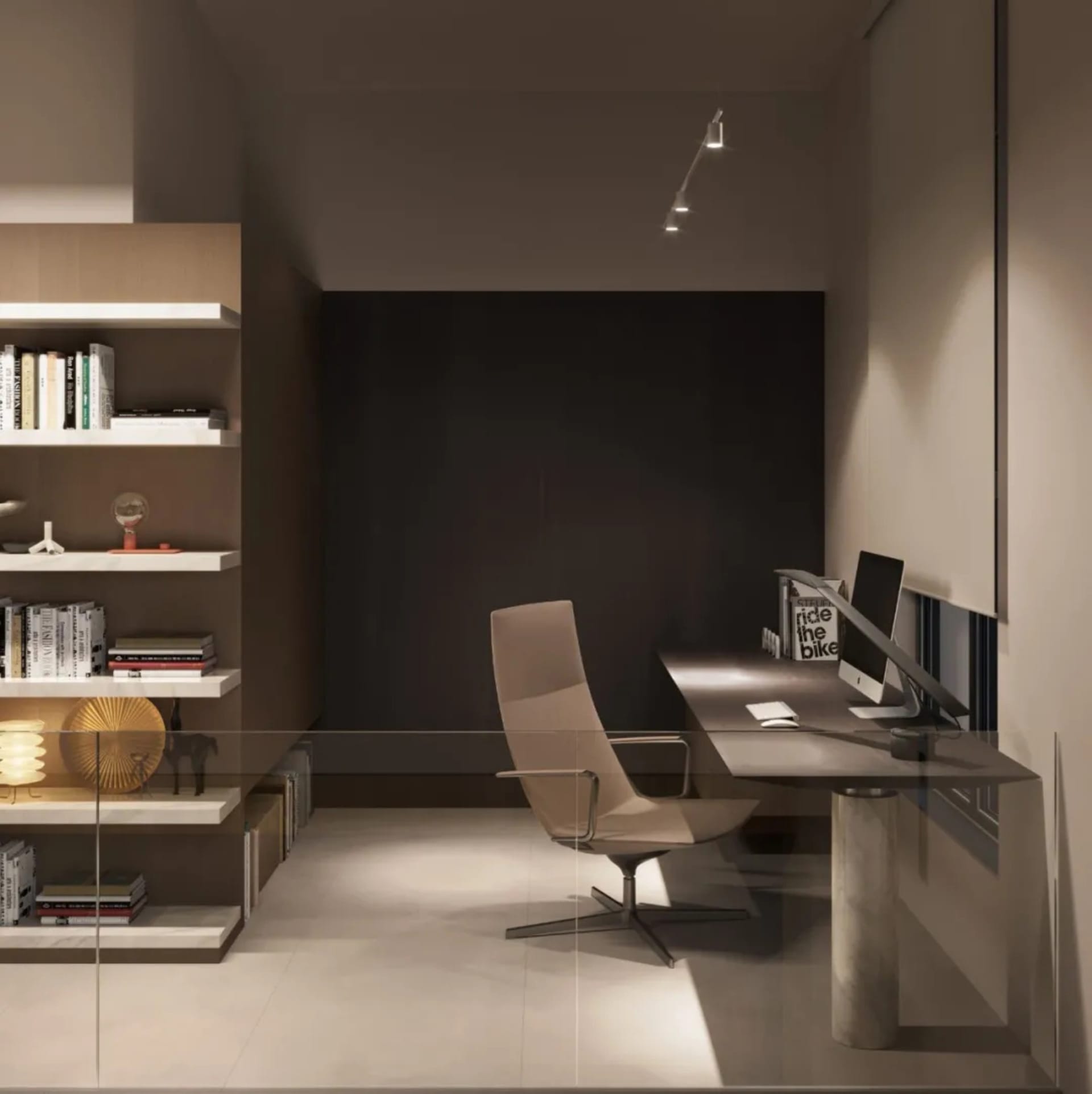 A modern home office featuring a glass wall with minimalist design and sleek, contemporary furniture.