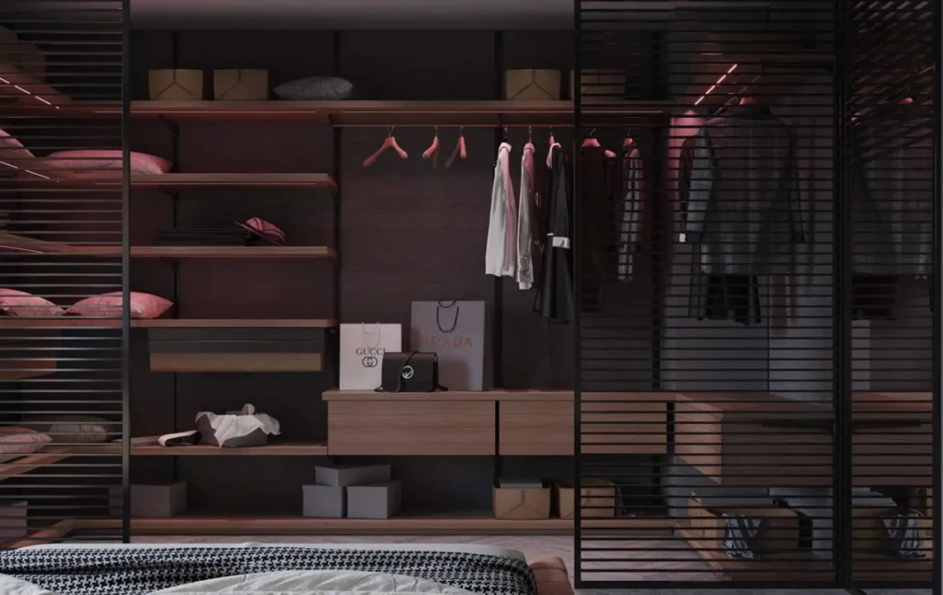 A modern minimalist closet with wooden shelves, metal railings, and clothes hanging on pink hangers.