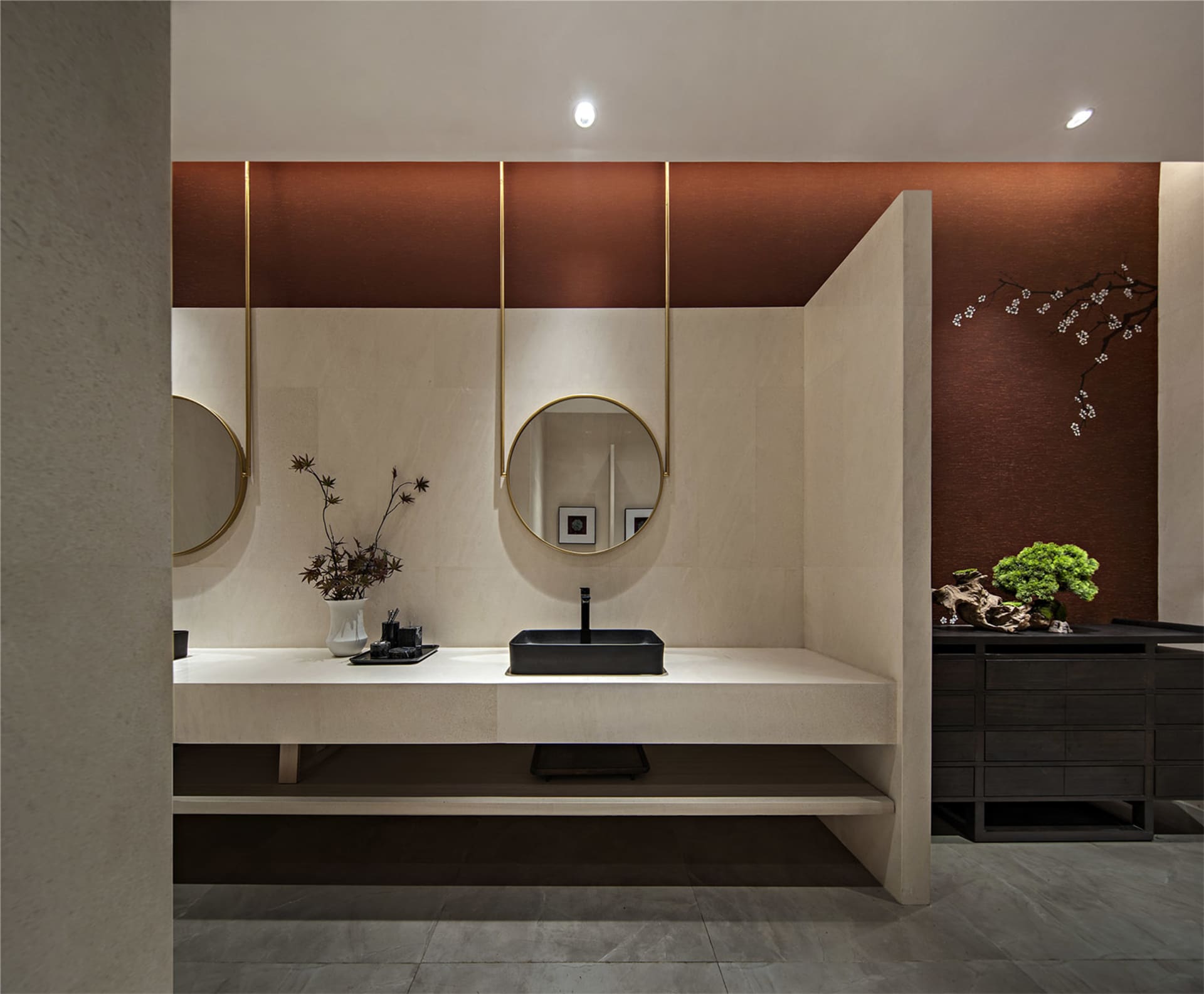 A minimalist modern bathroom with a concrete countertop, wood cabinets, and concrete sink.