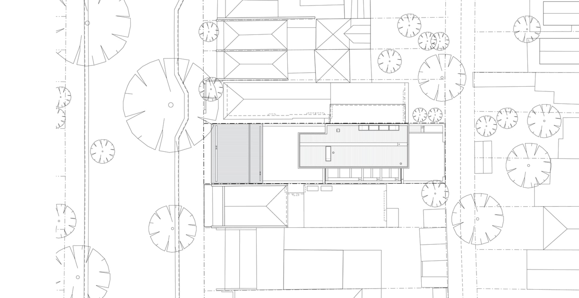 2D architectural drawing of a modern building layout on white paper