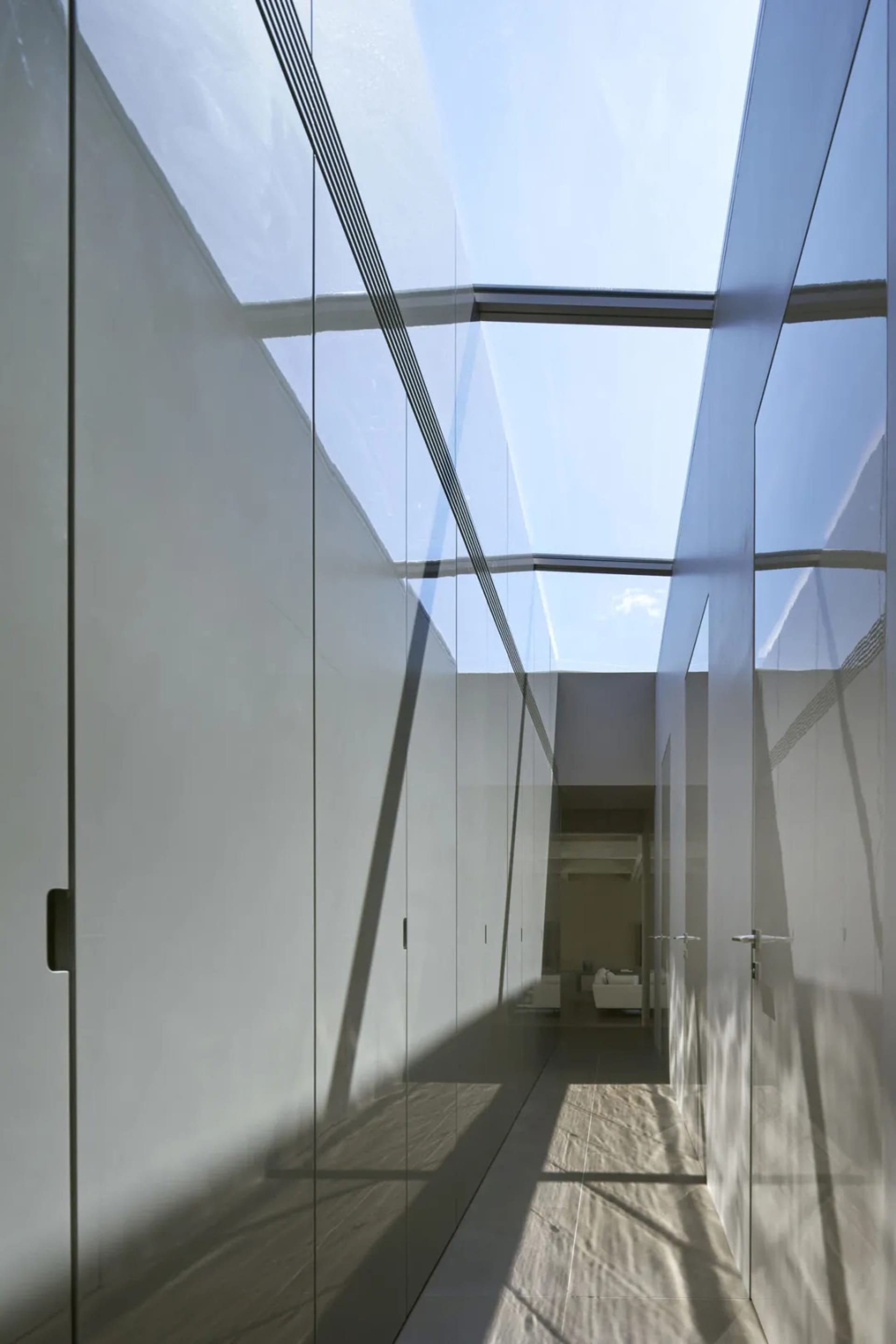 Modern architecture interior with glass and concrete design elements.