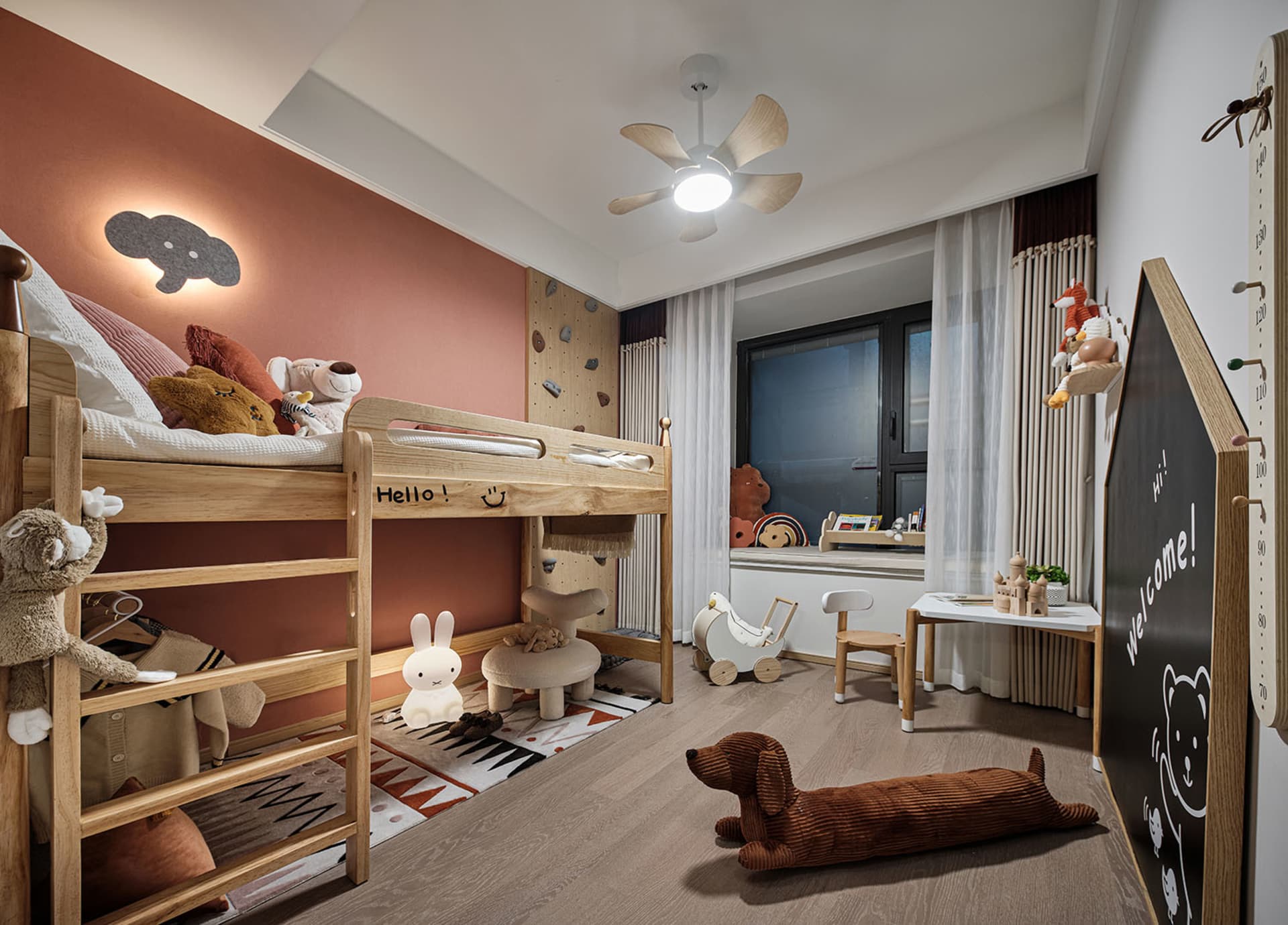 A cozy children's room with wooden furniture, plush toys, and a climbing wall.