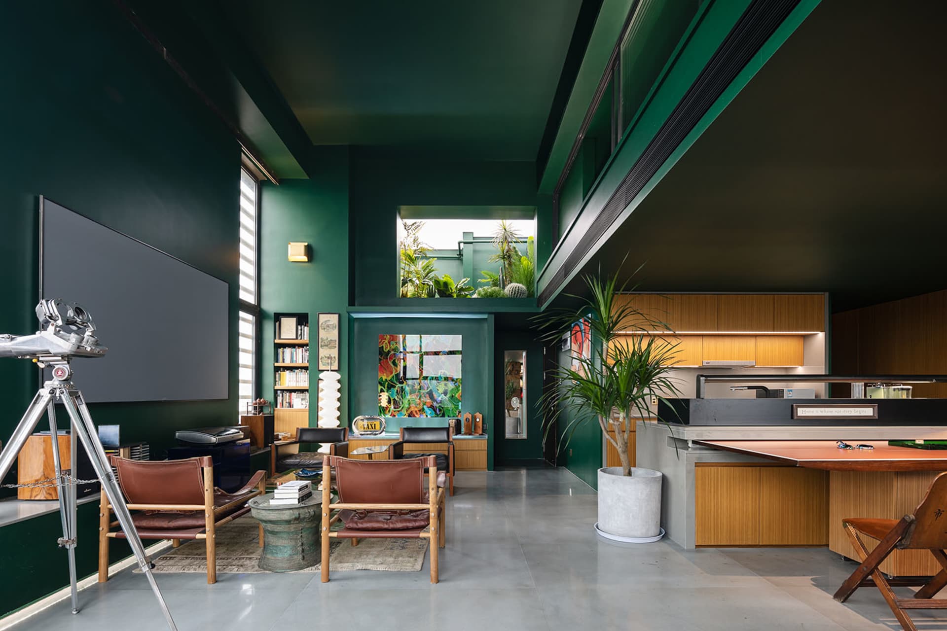 Modern living space featuring contemporary design with concrete materials.