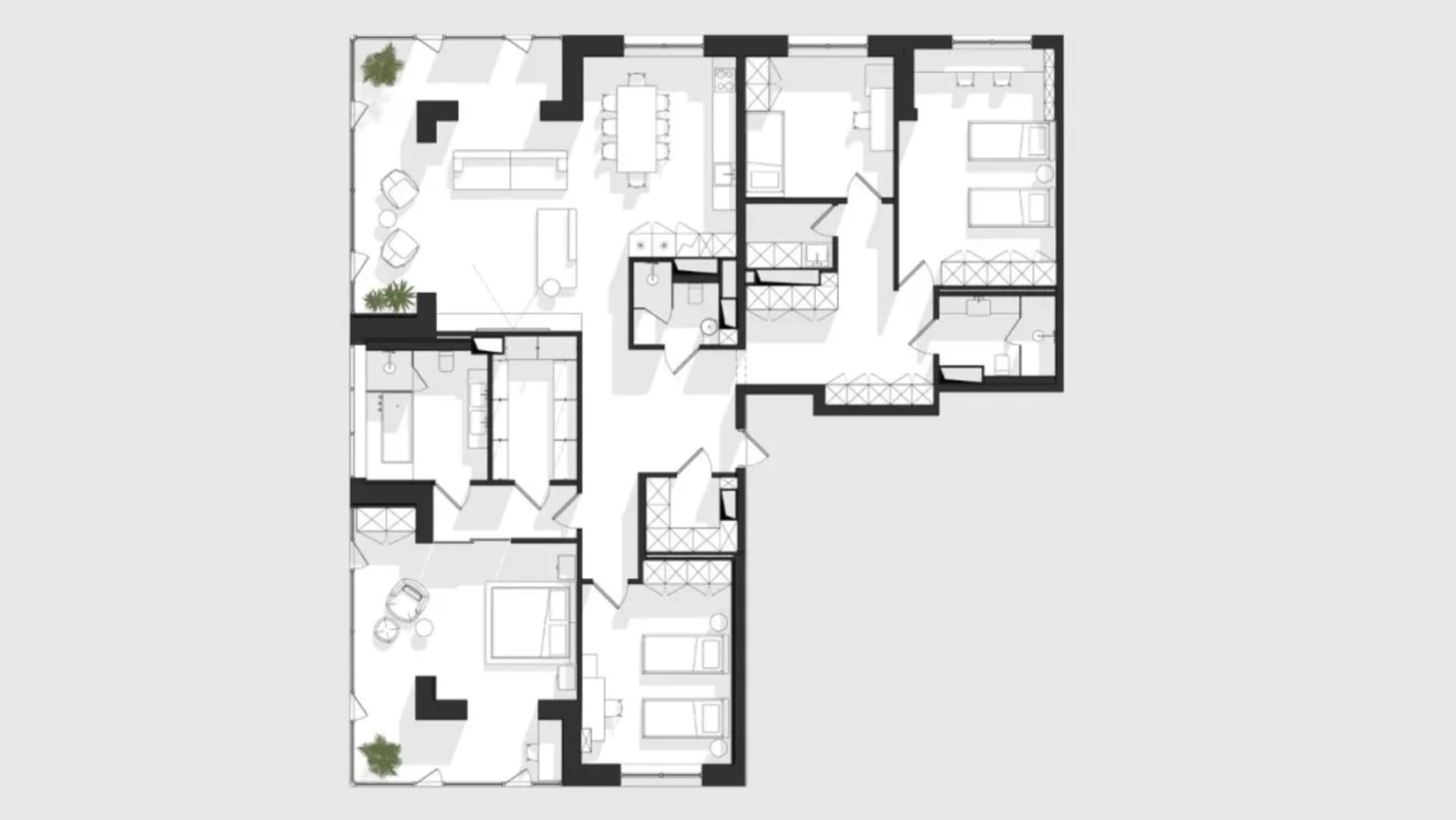Floor plan of a modern apartment showing living areas, bedrooms, bathrooms, and kitchen.