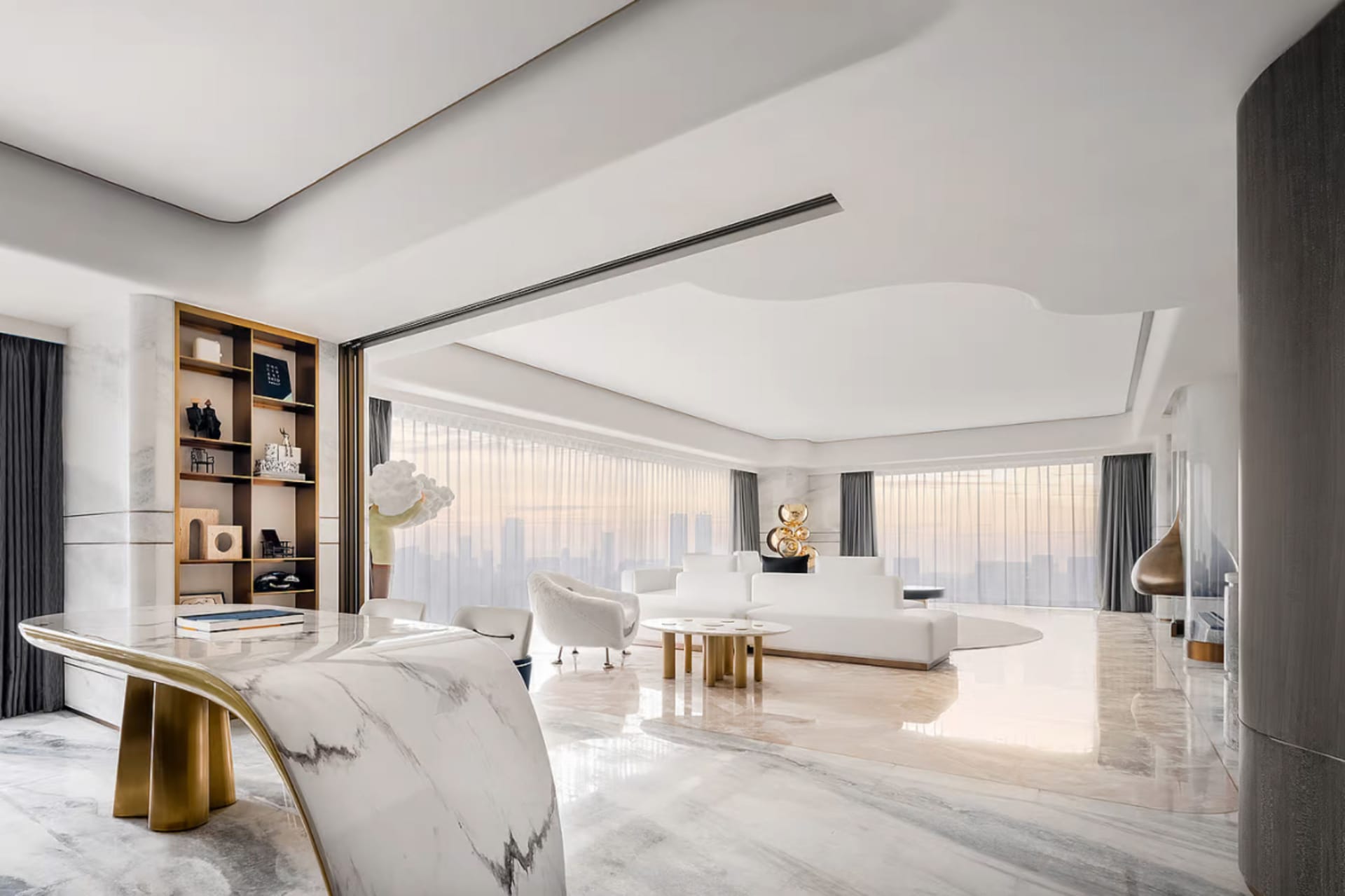 Modern minimalist living room with marble flooring, gold accents, and white furniture.