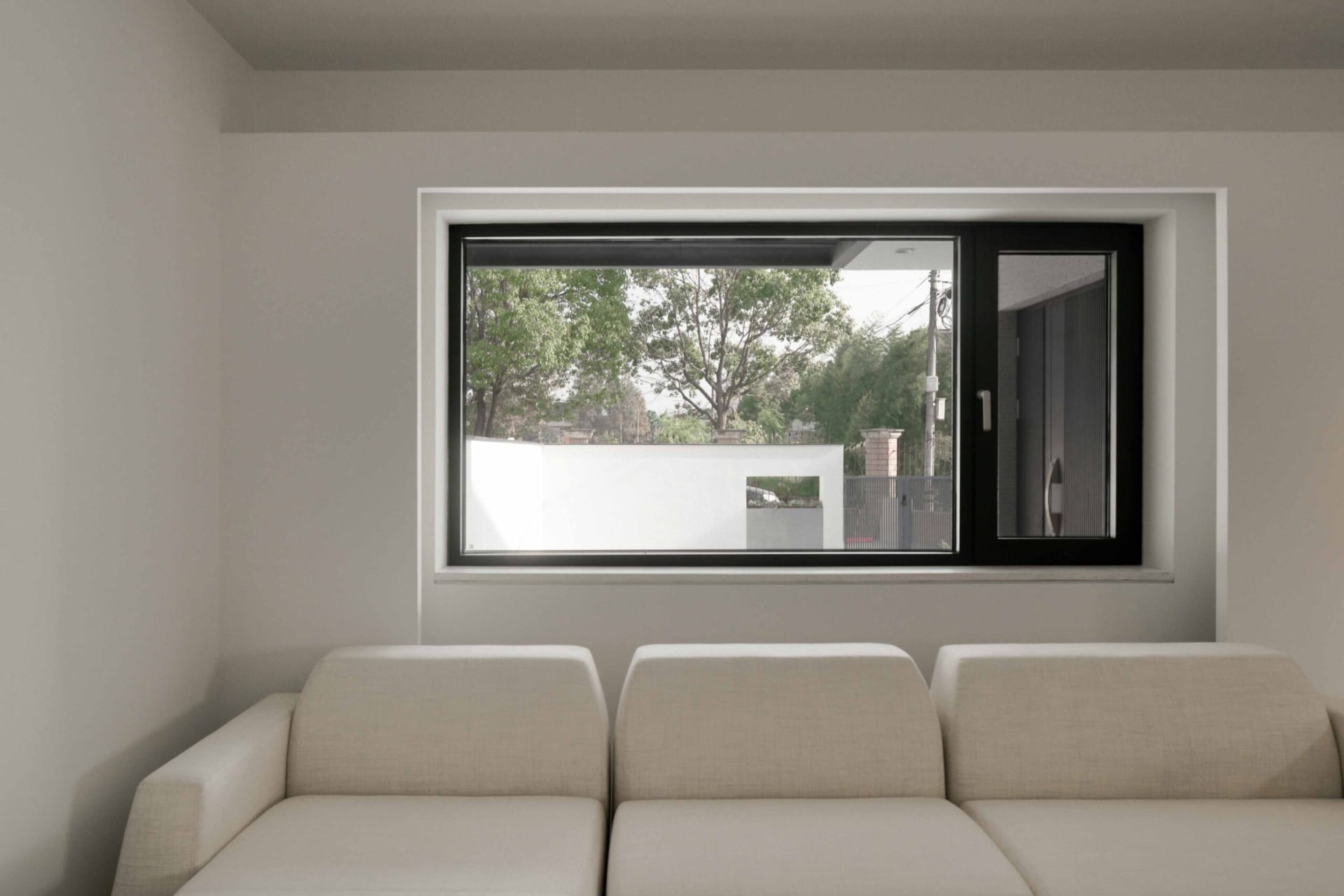 White fabric sofa in a modern living room.