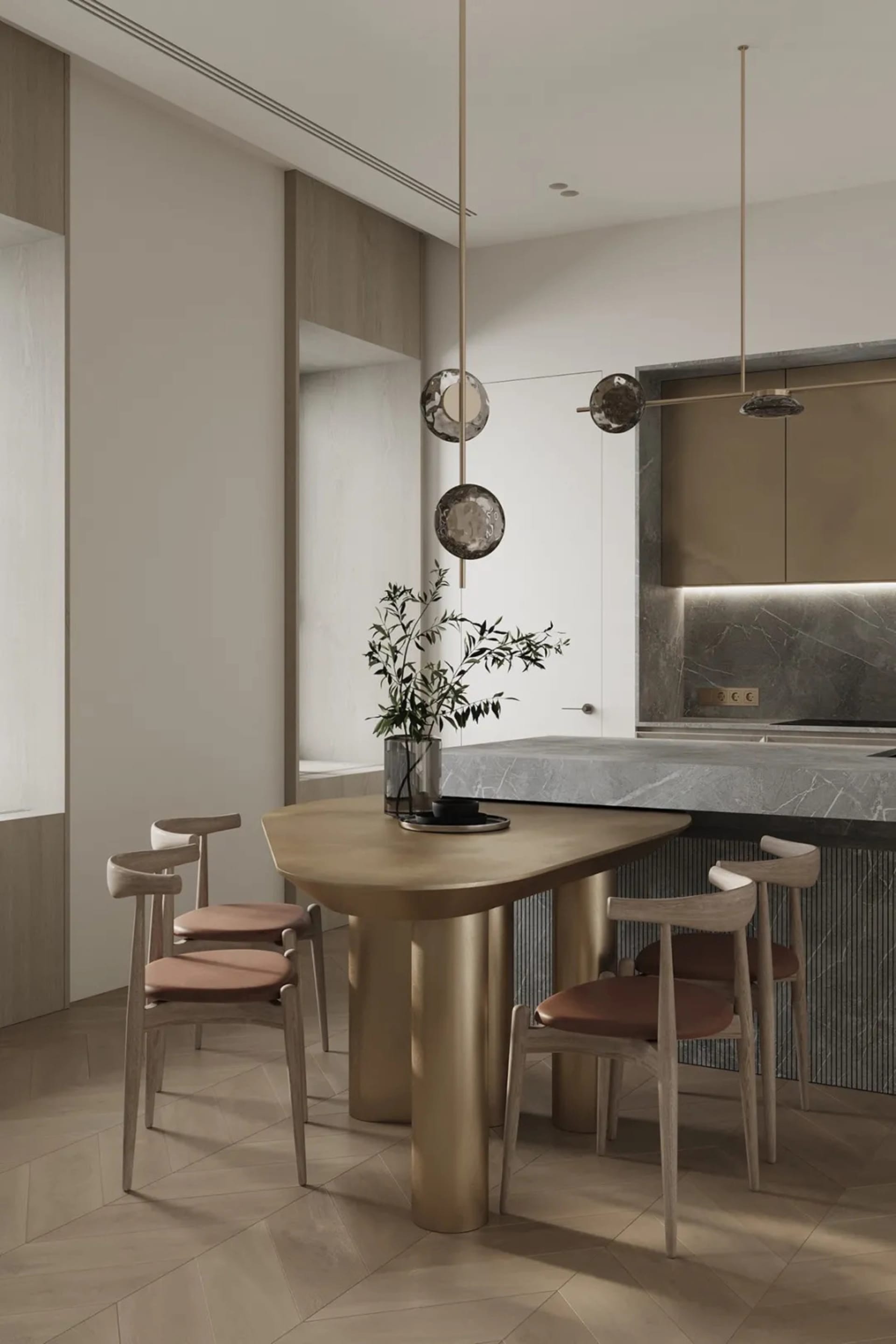 Modern kitchen with a dining table made of a combination of metal and marble, featuring minimalist design elements.