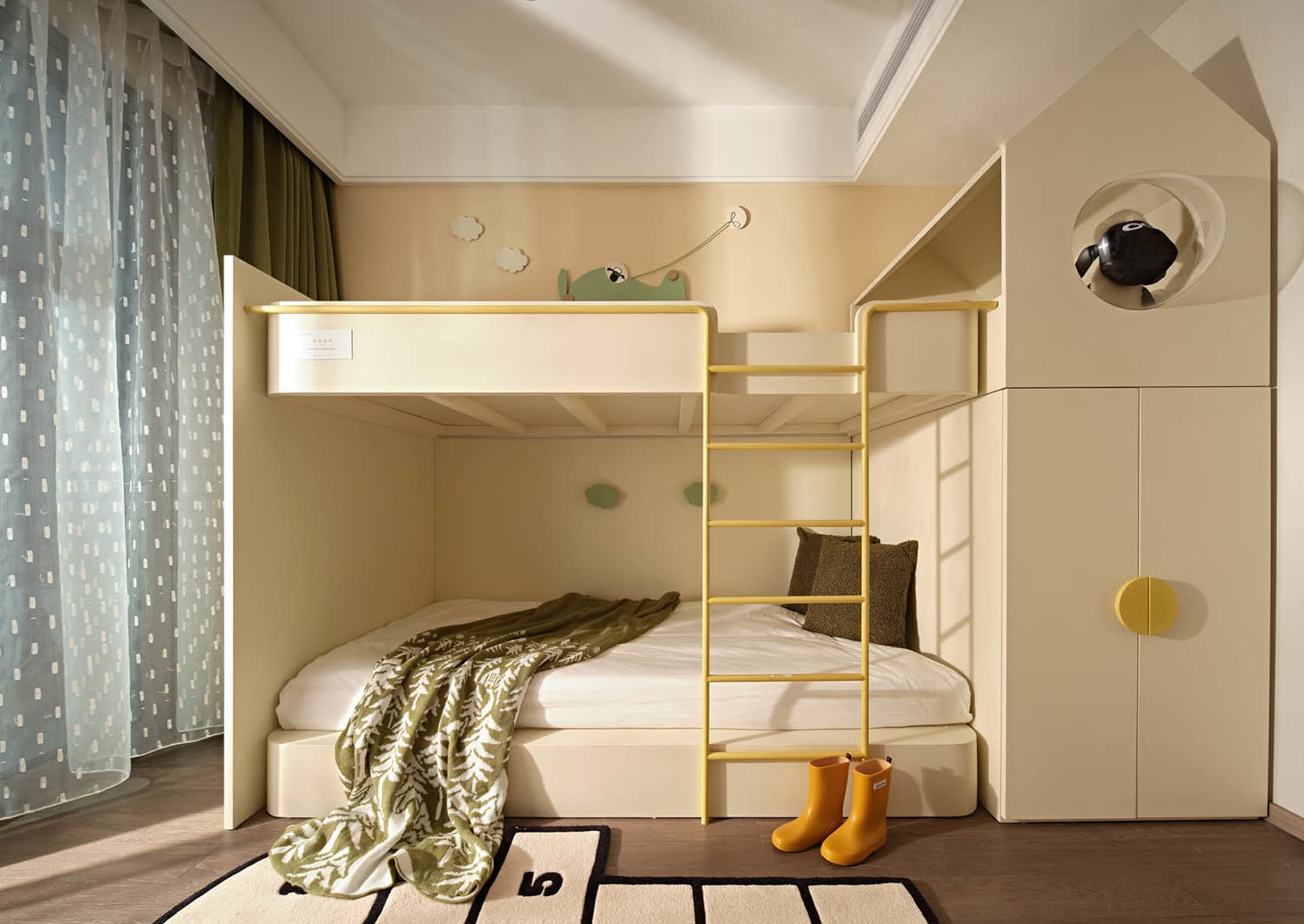 A minimalist children's bedroom featuring a bunk bed, wardrobe, rug, and yellow ladder.