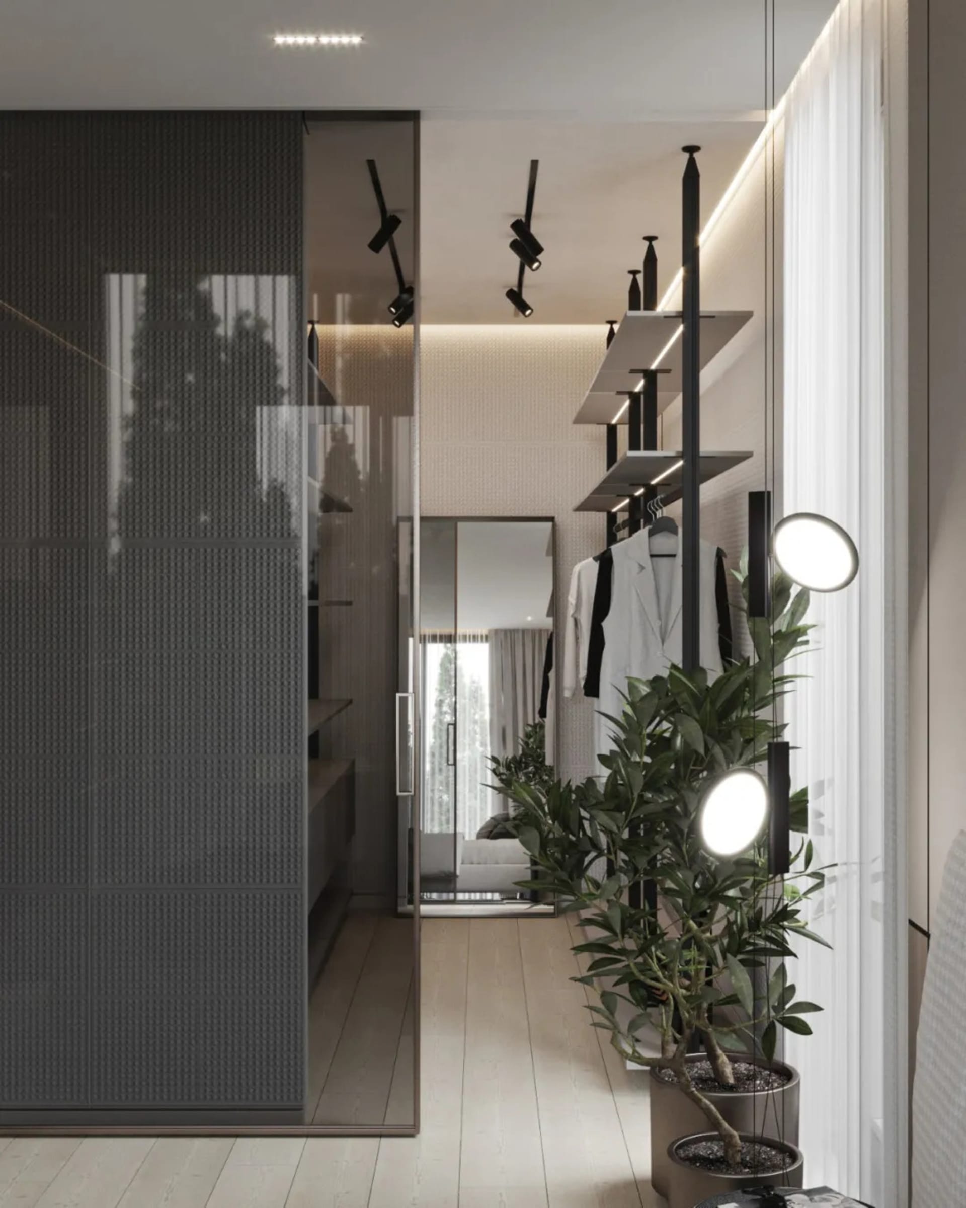 A modern interior design wardrobe with metallic accents, glass doors, and concrete flooring.
