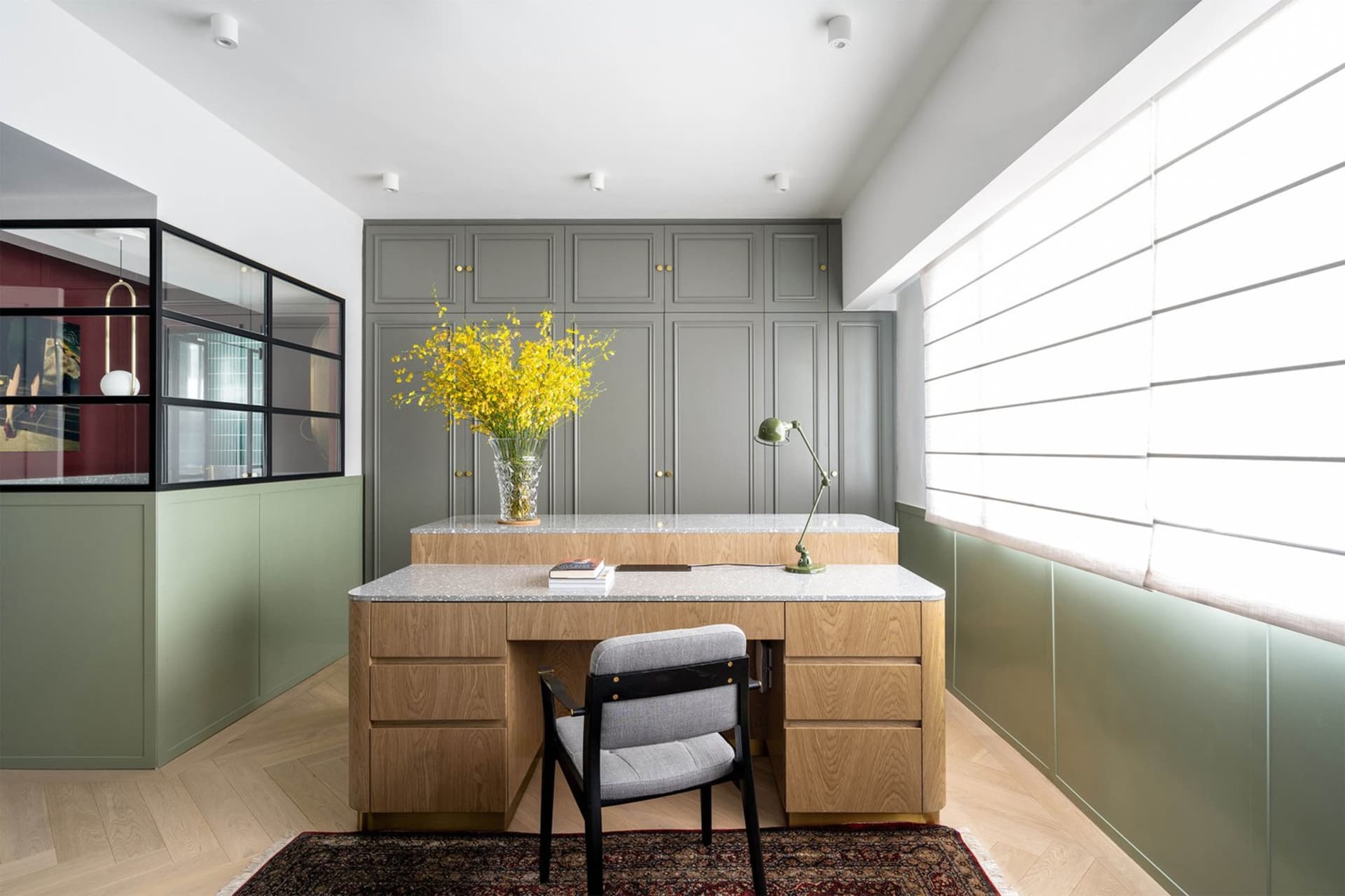 Modern office space featuring wood, glass, metal, and textiles