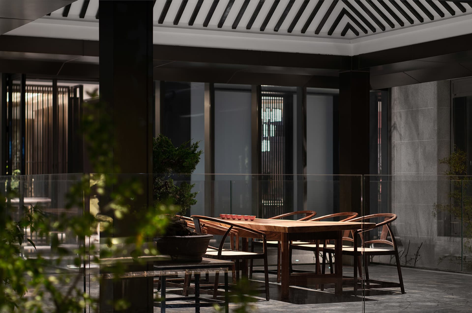 A modern interior design featuring wooden furniture in a coffee shop.