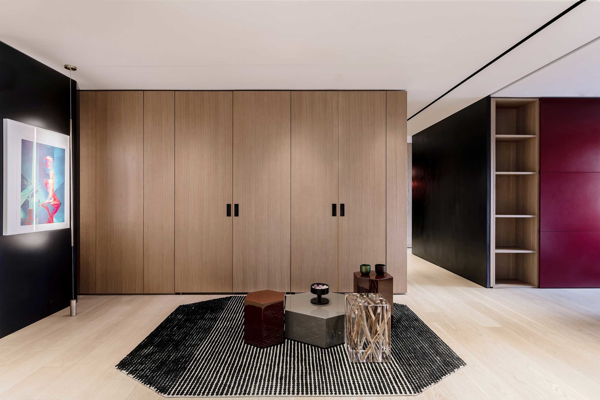 Modern living room with wooden furniture and minimalist design.
