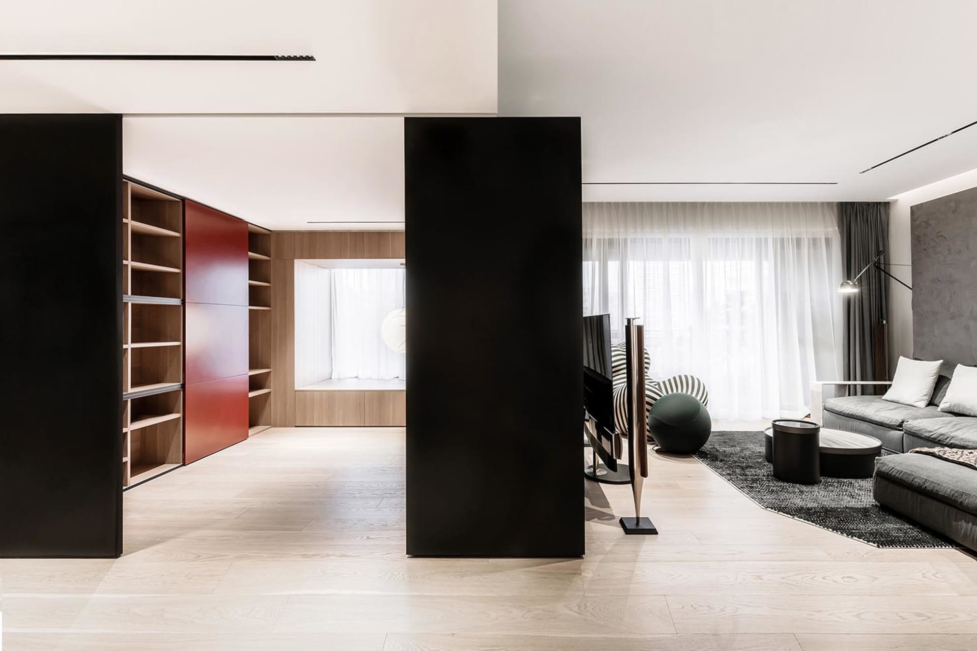 Modern living room designed with wood, metal, and fabric elements.
