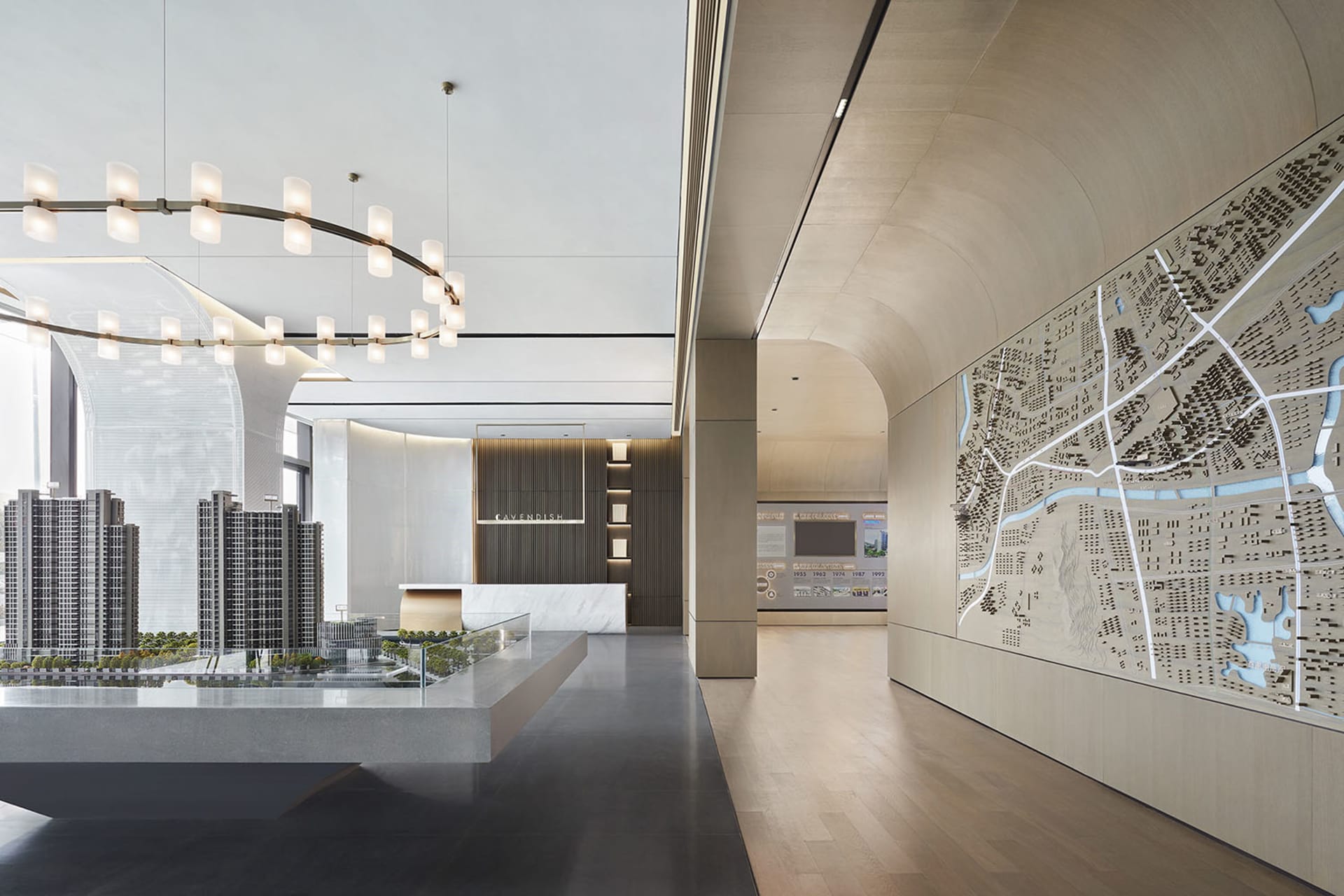 Modern showroom featuring wood, glass, and concrete materials
