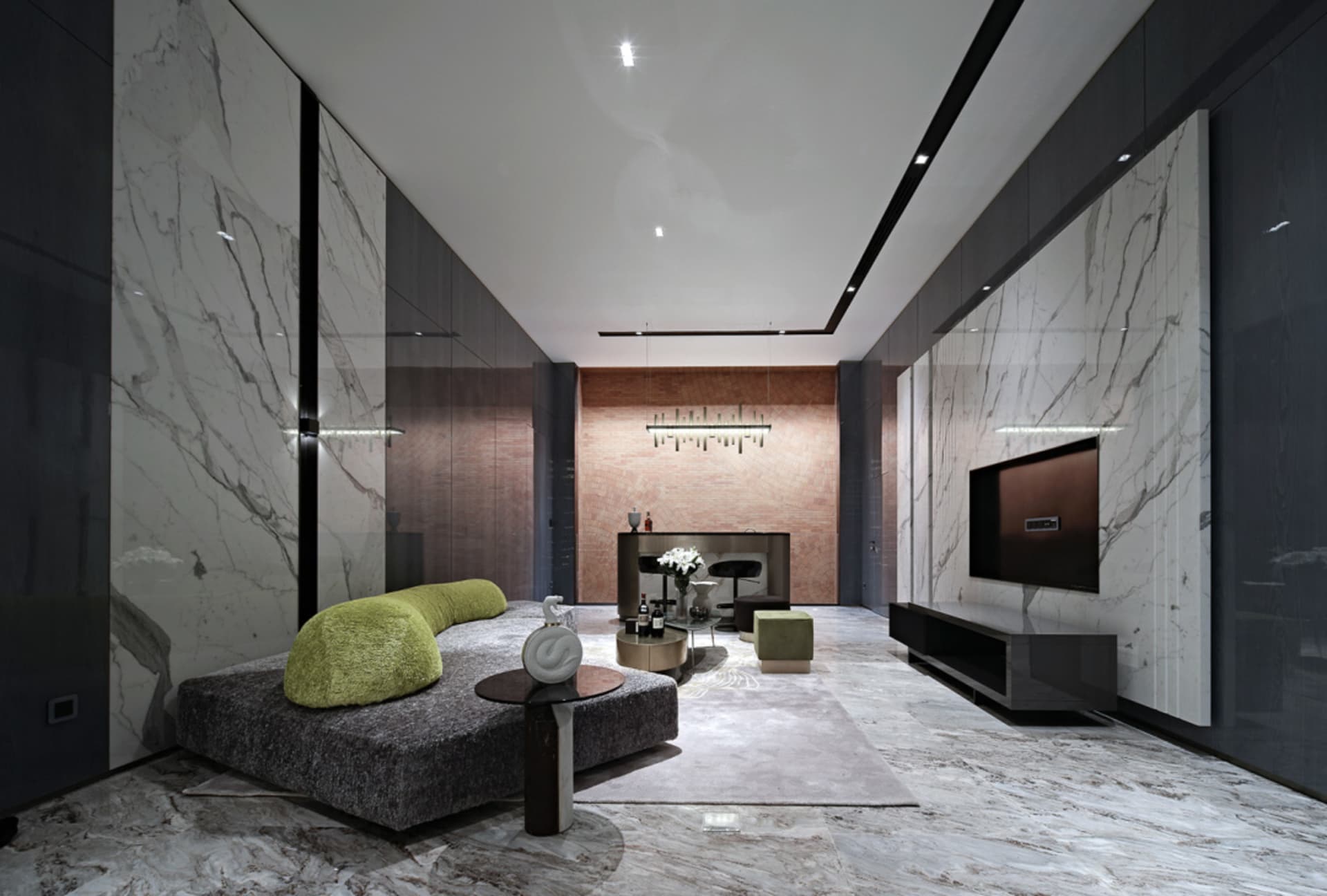 Modern living room featuring marble walls and floor