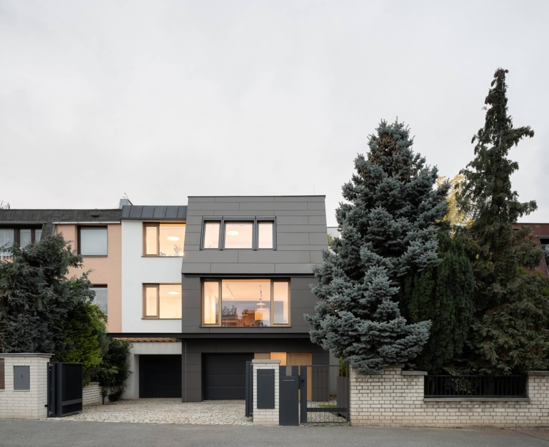 Modern house with metal clad windows and concrete foundation