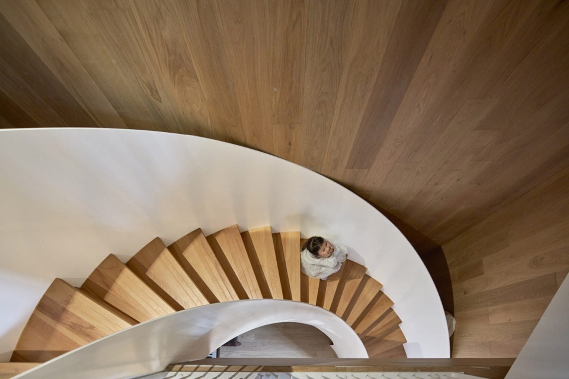 Modern, open concept staircase made of wood.