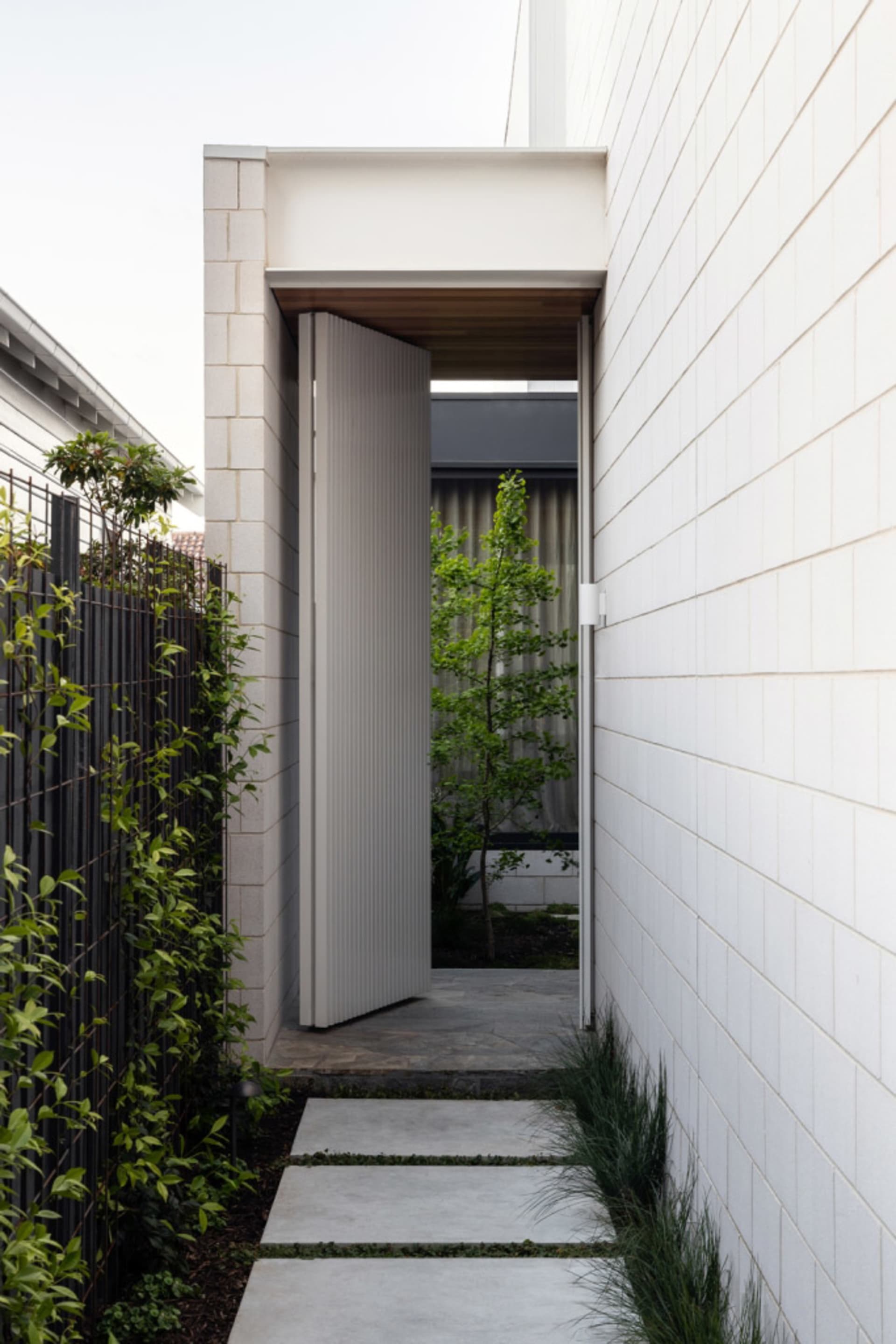 A modern concrete walkway with minimalist design elements.
