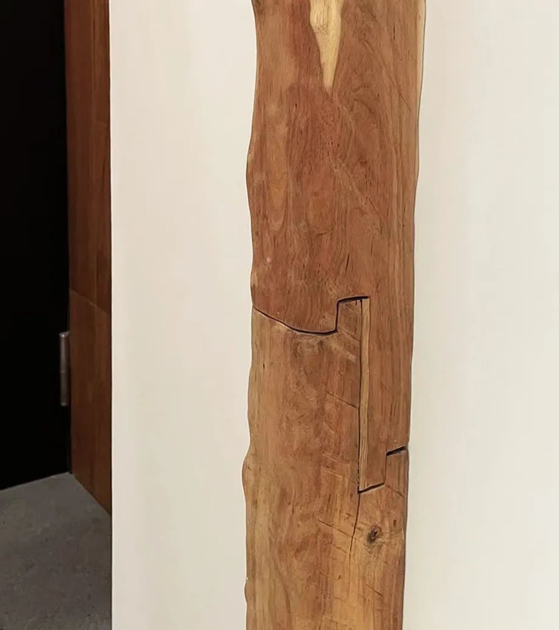 Modern sculpture made of wood in an interior space