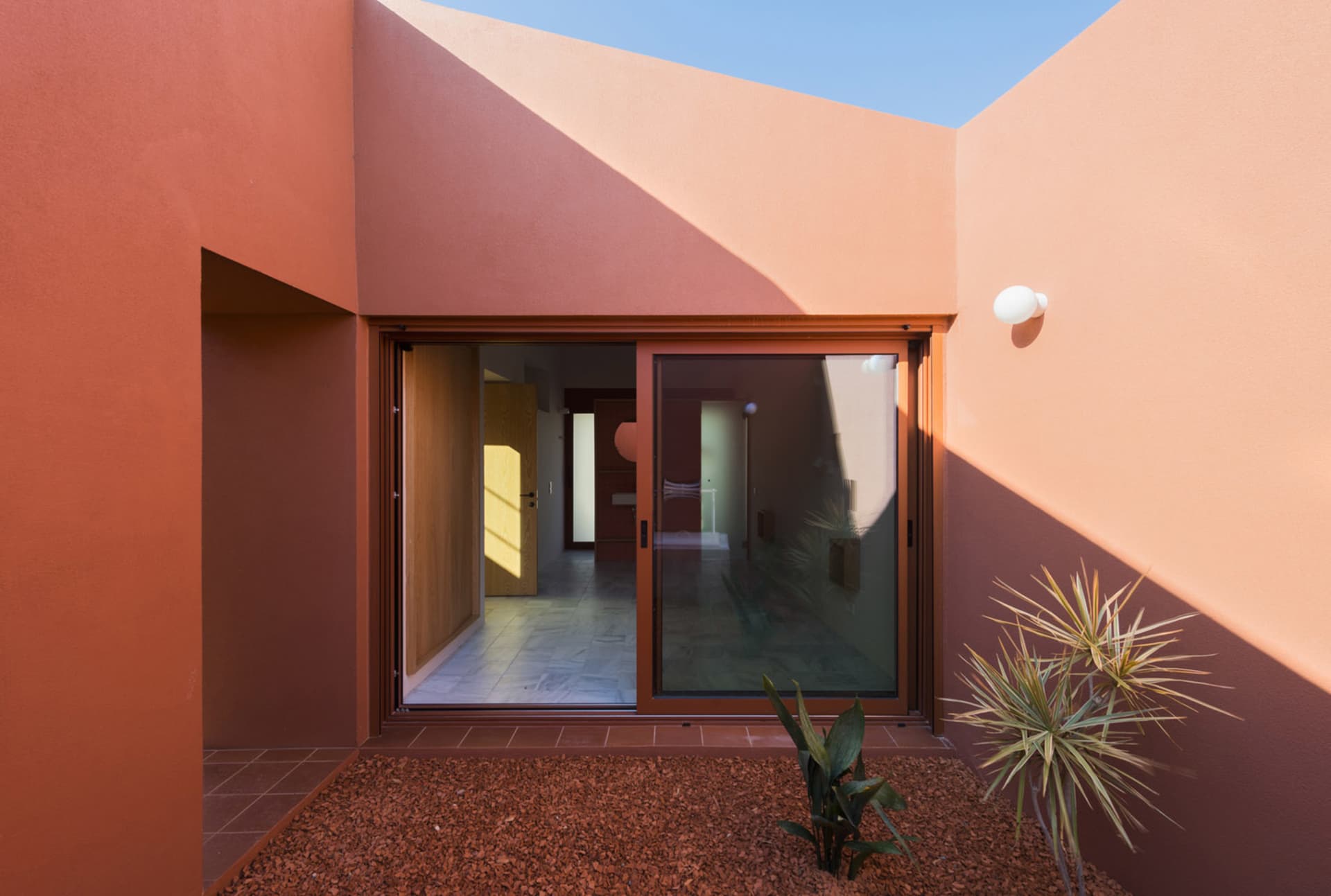 A modern architectural design featuring clay materials.