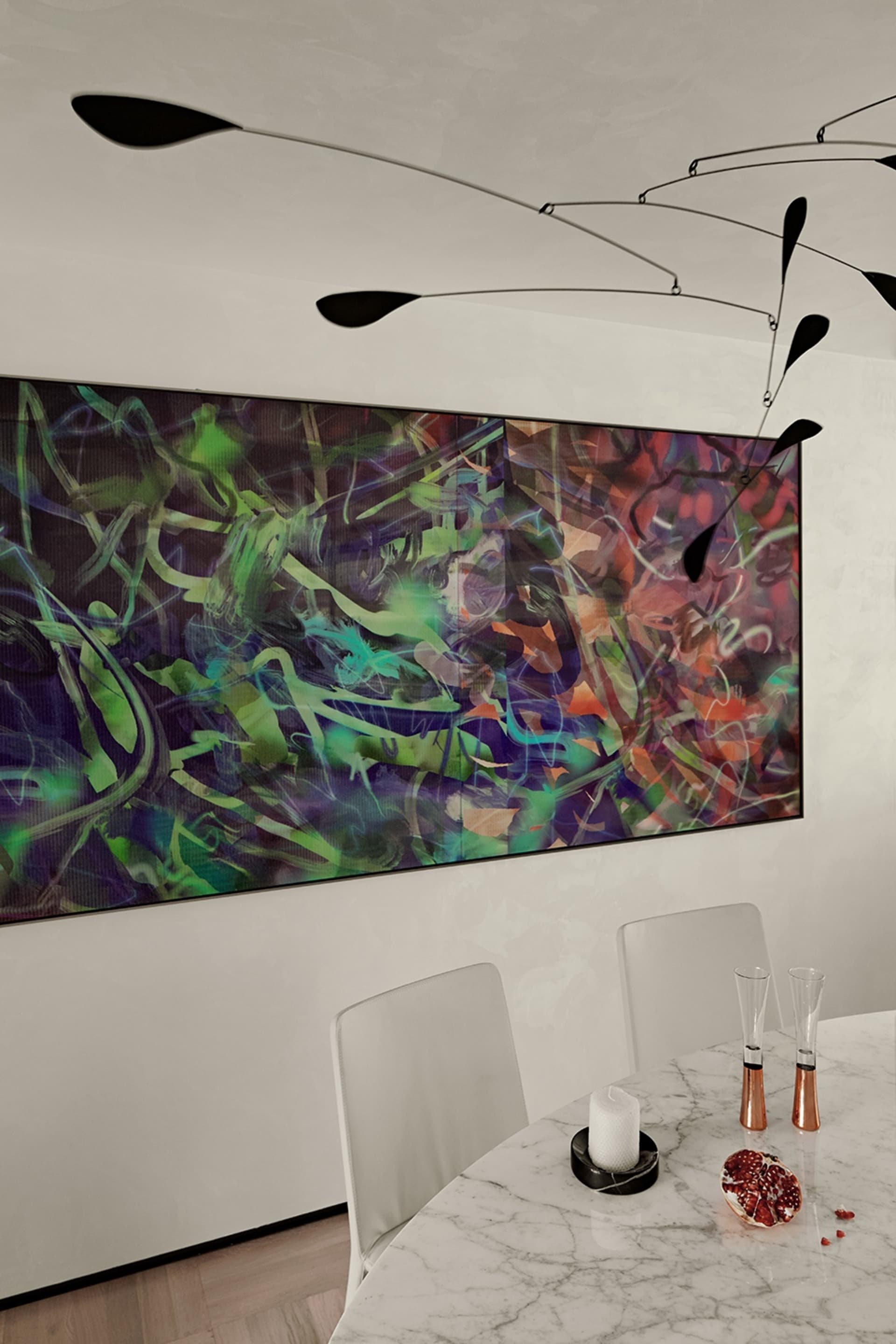 A vibrant abstract painting adorned the wall of a modern interior design space.