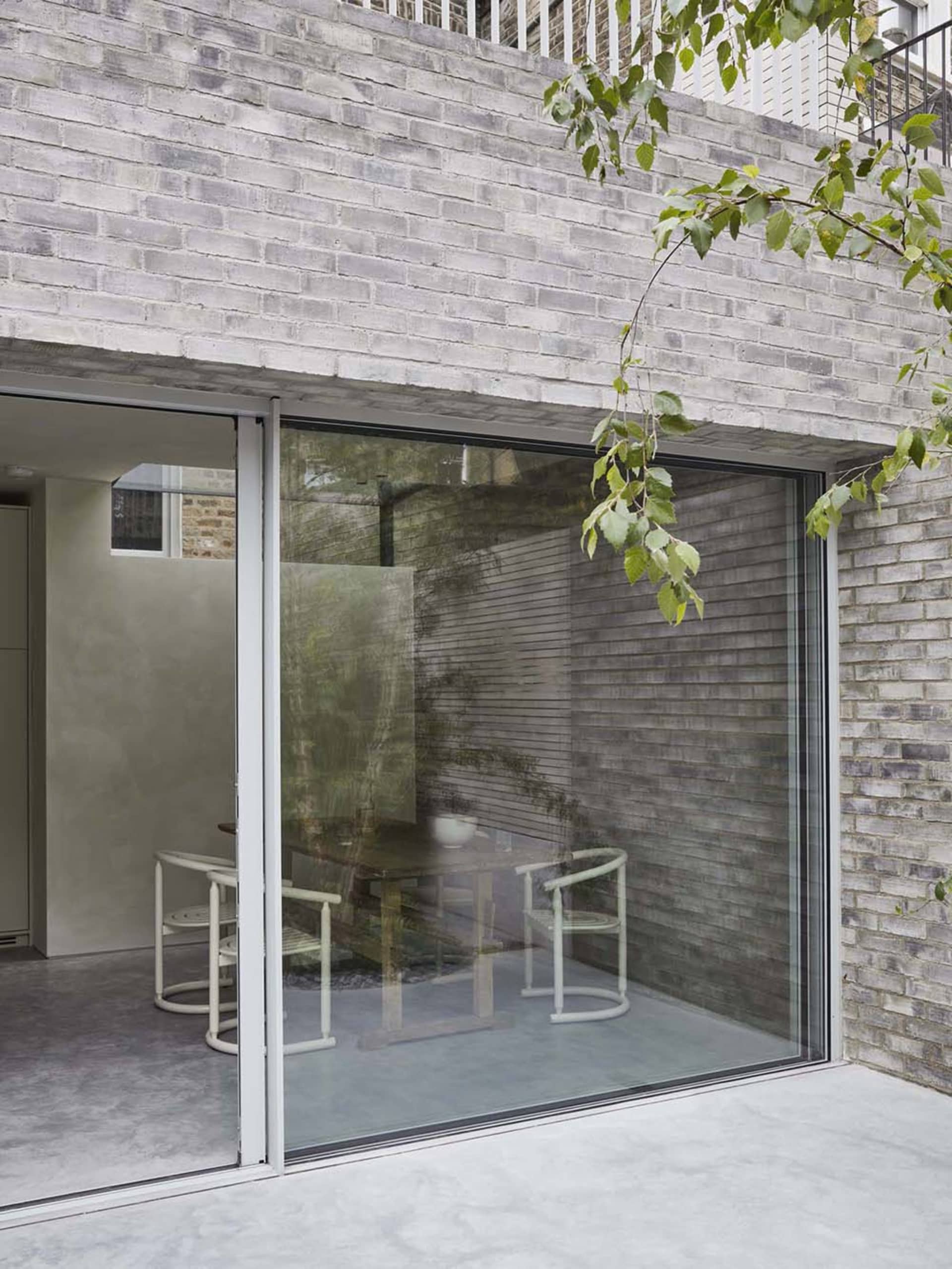 Modern exterior with a combination of brick and glass materials