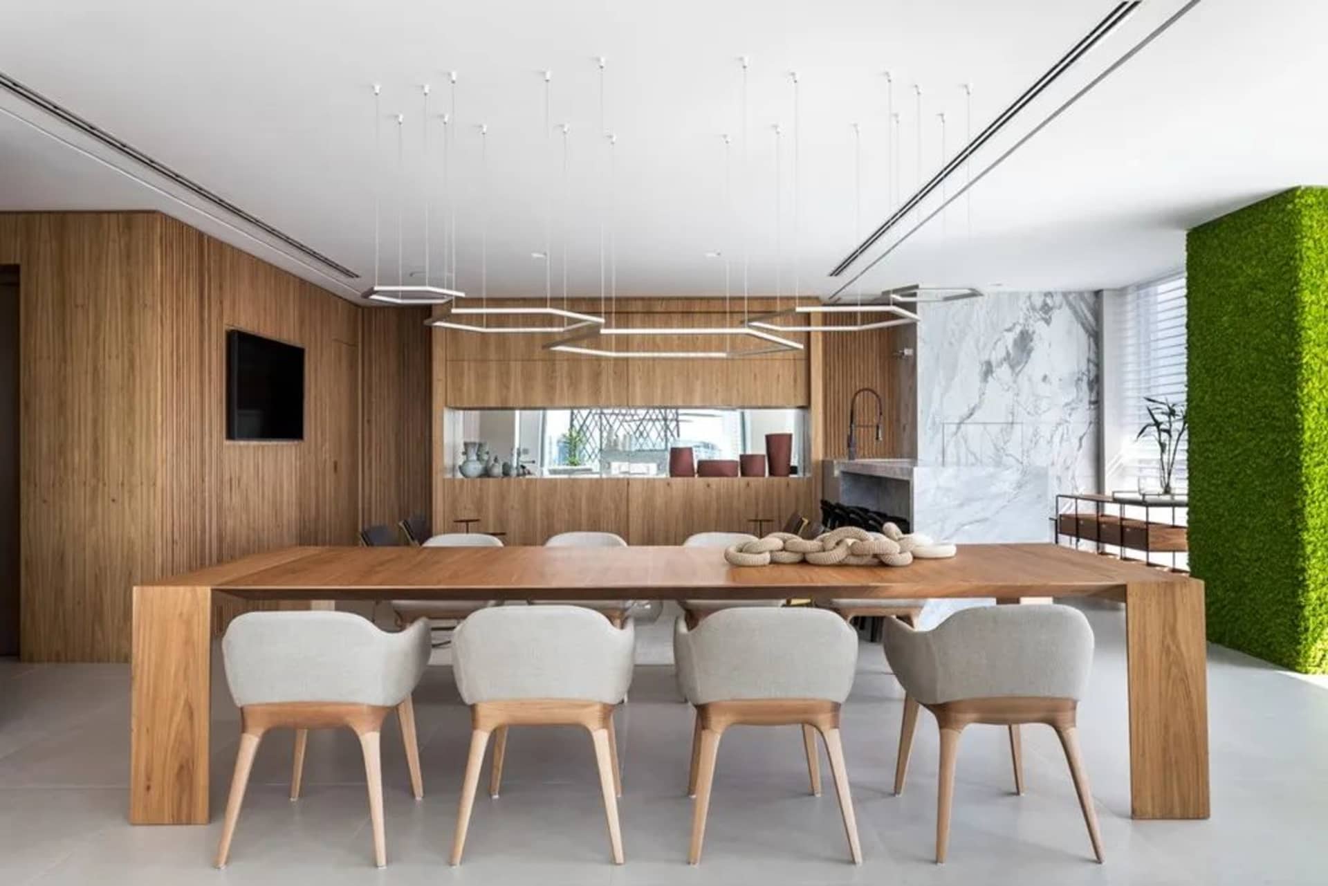 Modern living room with wooden furniture and marble accents