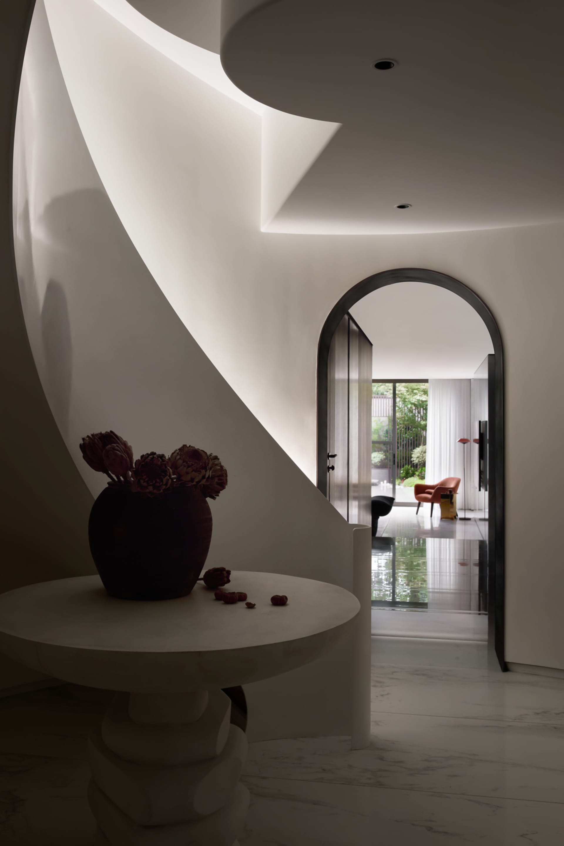 A modern interior design featuring marble elements.