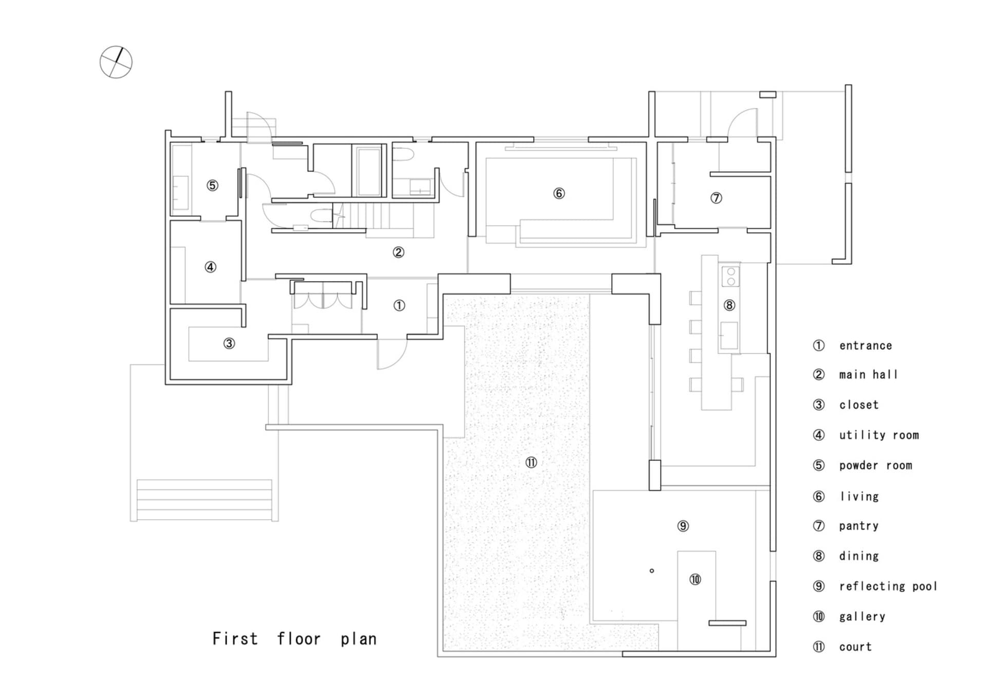 Floor plan of a residential building with labeled rooms and spaces.