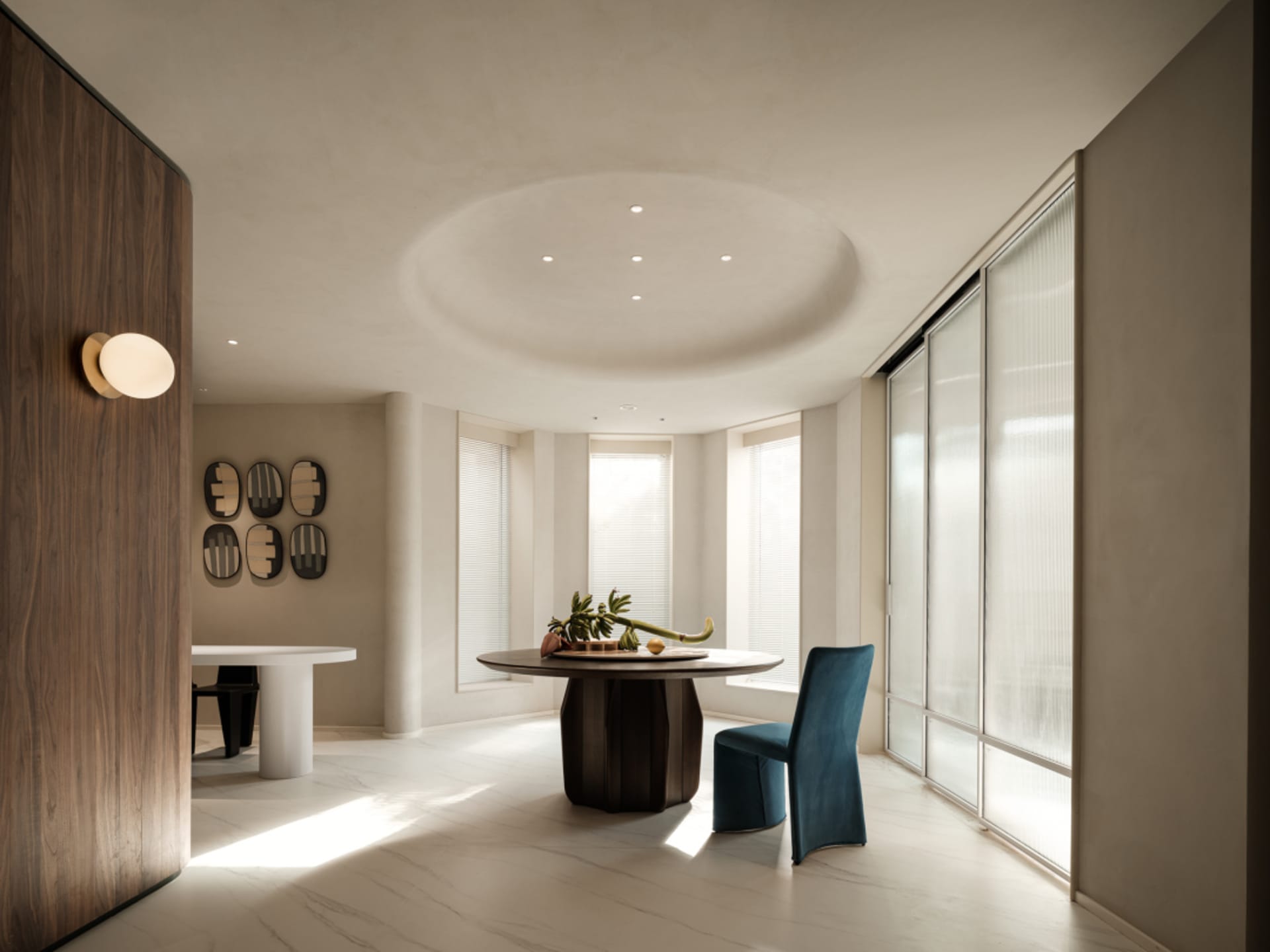 Modern living room featuring marble, wood, and glass materials.