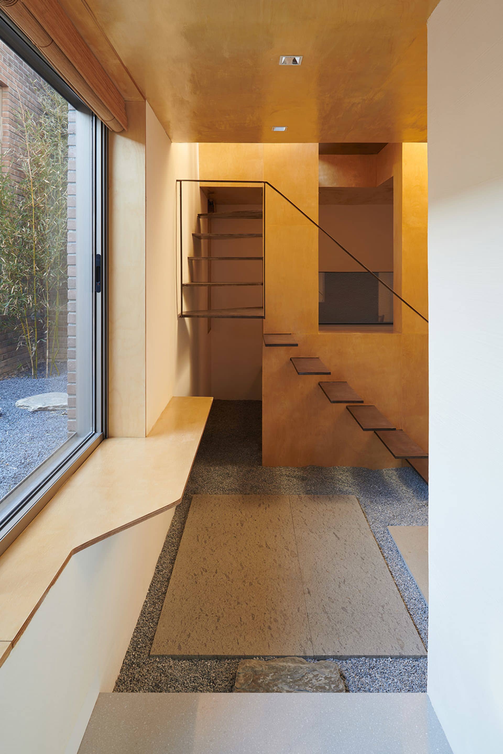 A modern interior with wooden elements and a minimalist aesthetic.