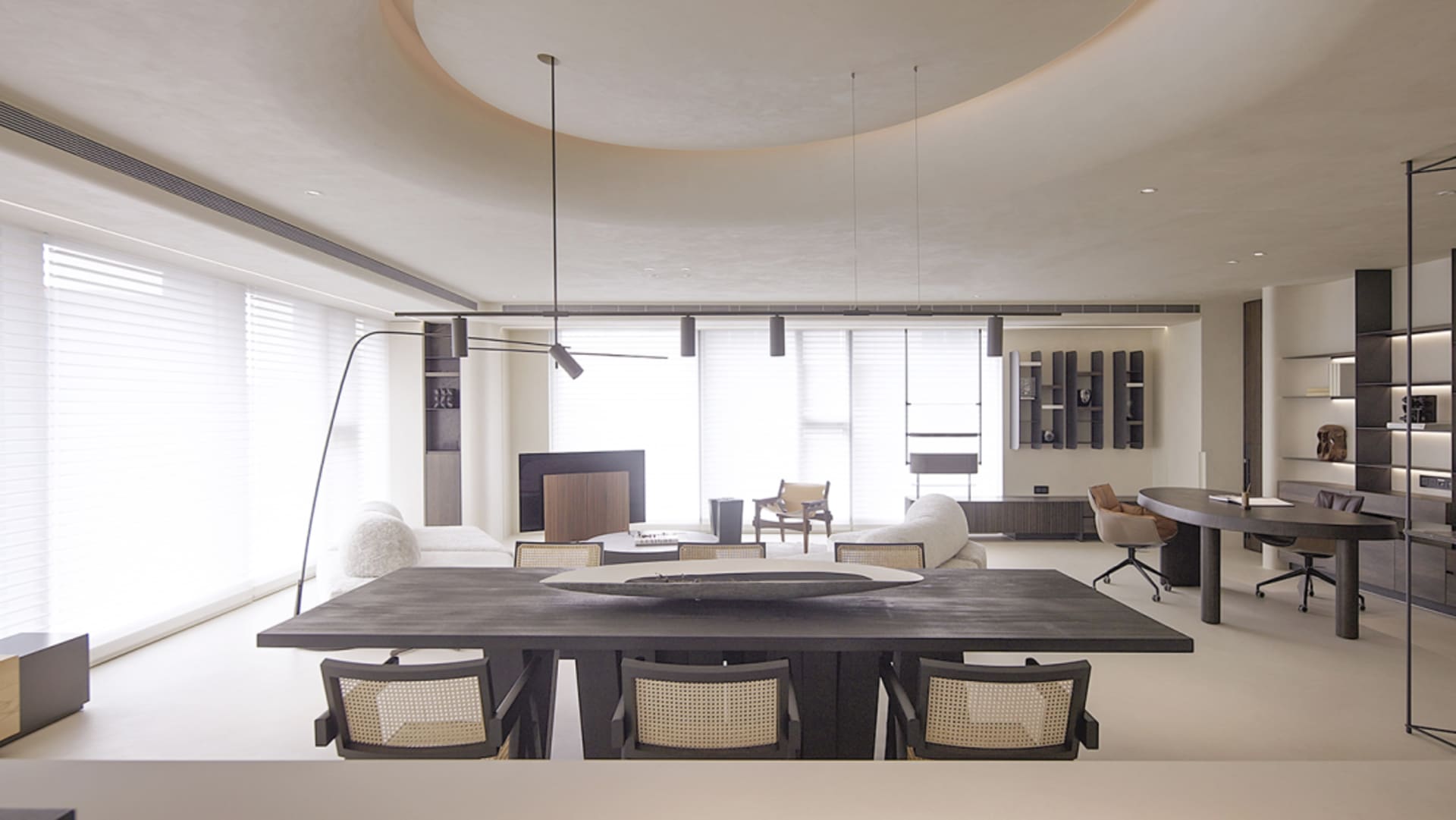 Modern living room with wooden furniture and concrete surfaces