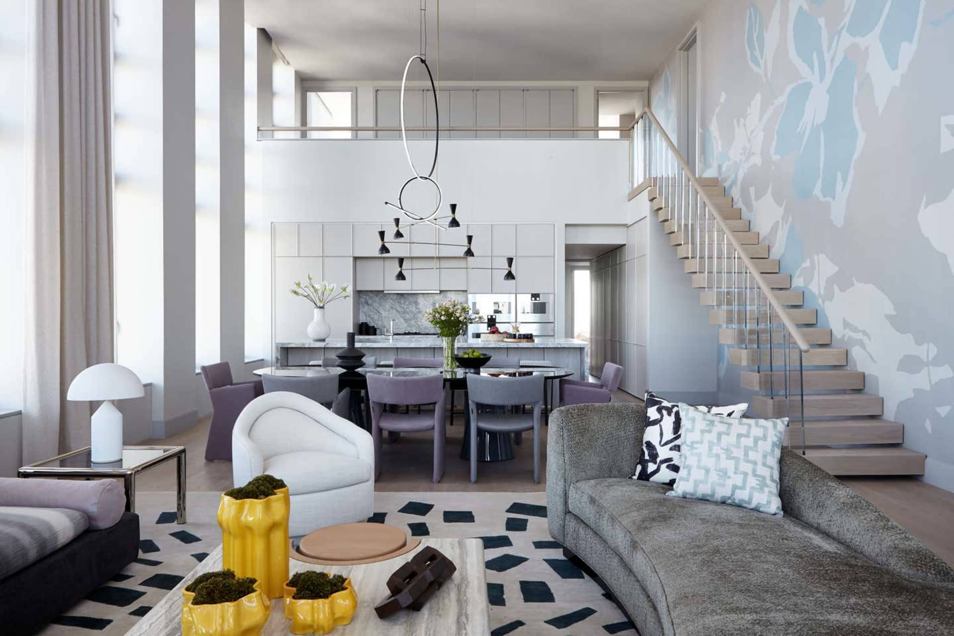 Modern living room with contemporary furniture and decor.