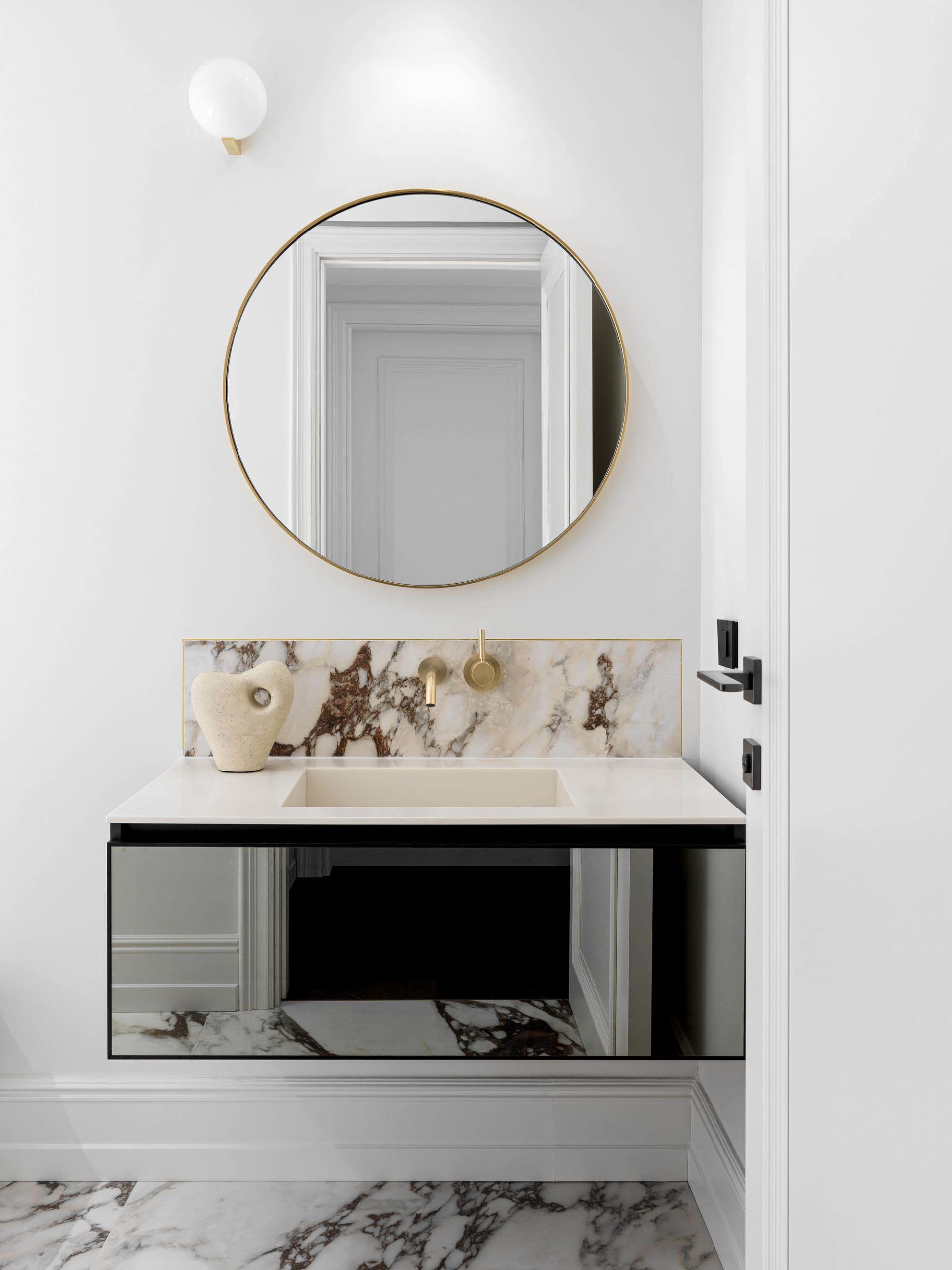 A modern marble bathroom