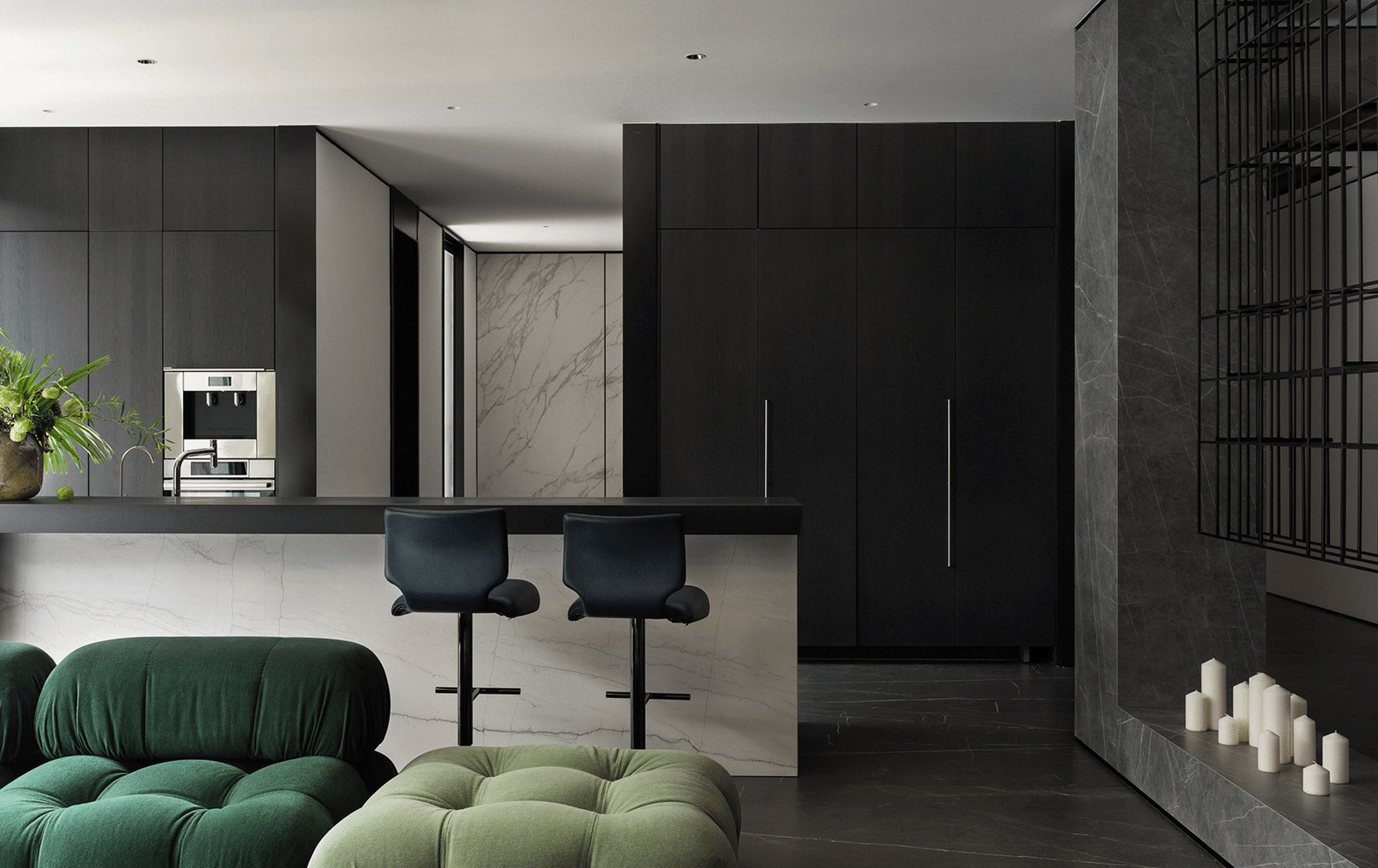 Modern kitchen featuring marble countertops, dark wood cabinets, and metallic accents.