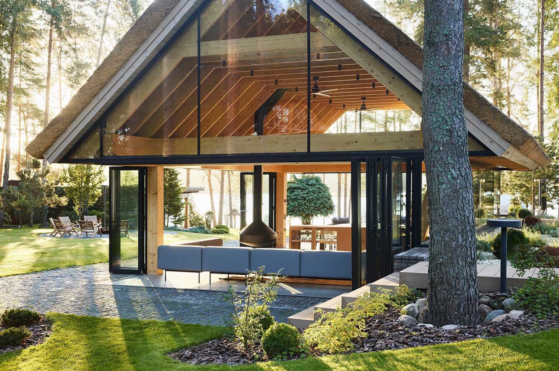 Modern house exterior with timber and glass materials.