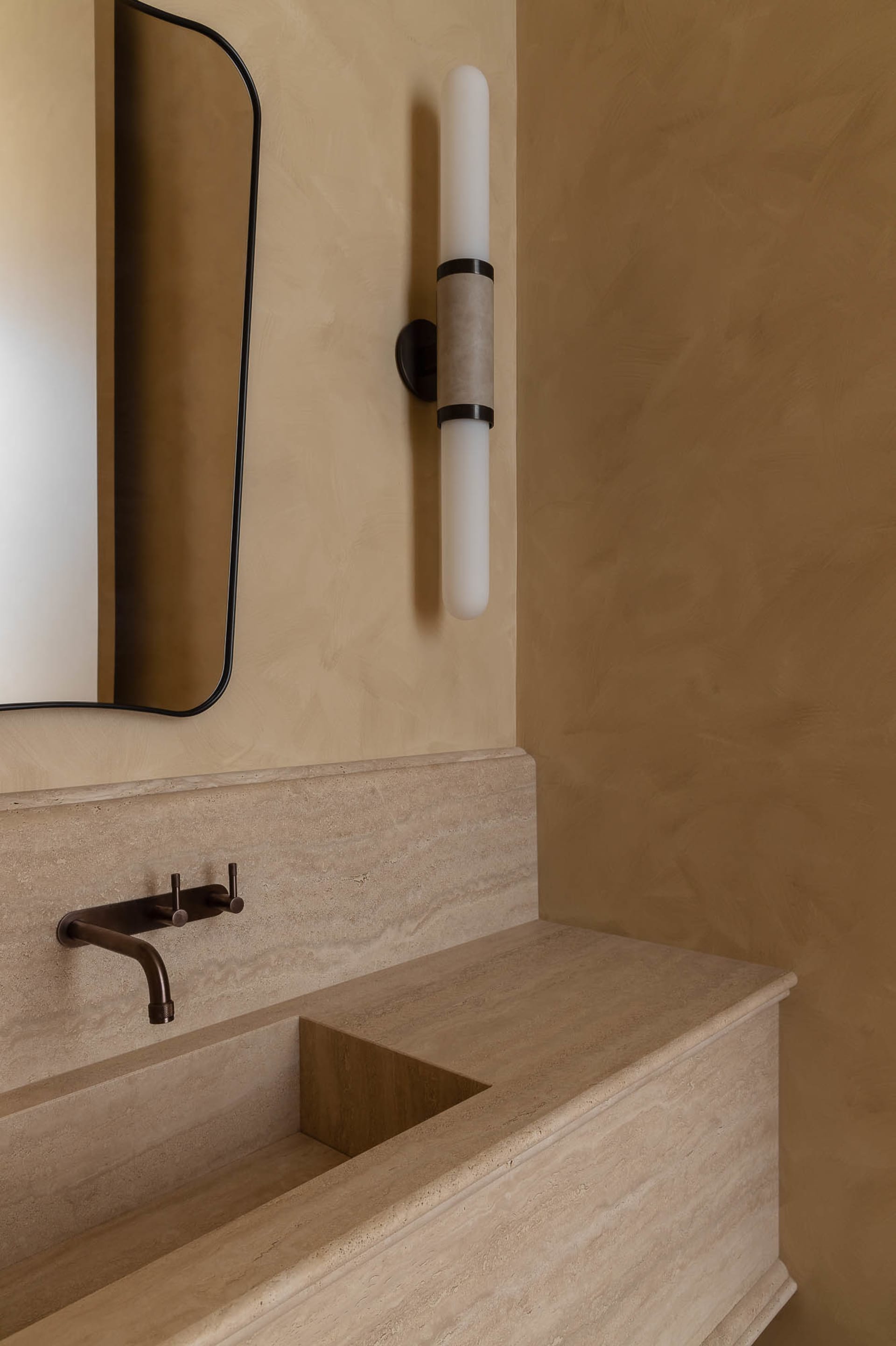 Geometric marble bathroom with minimalist design features isolated on beige background.