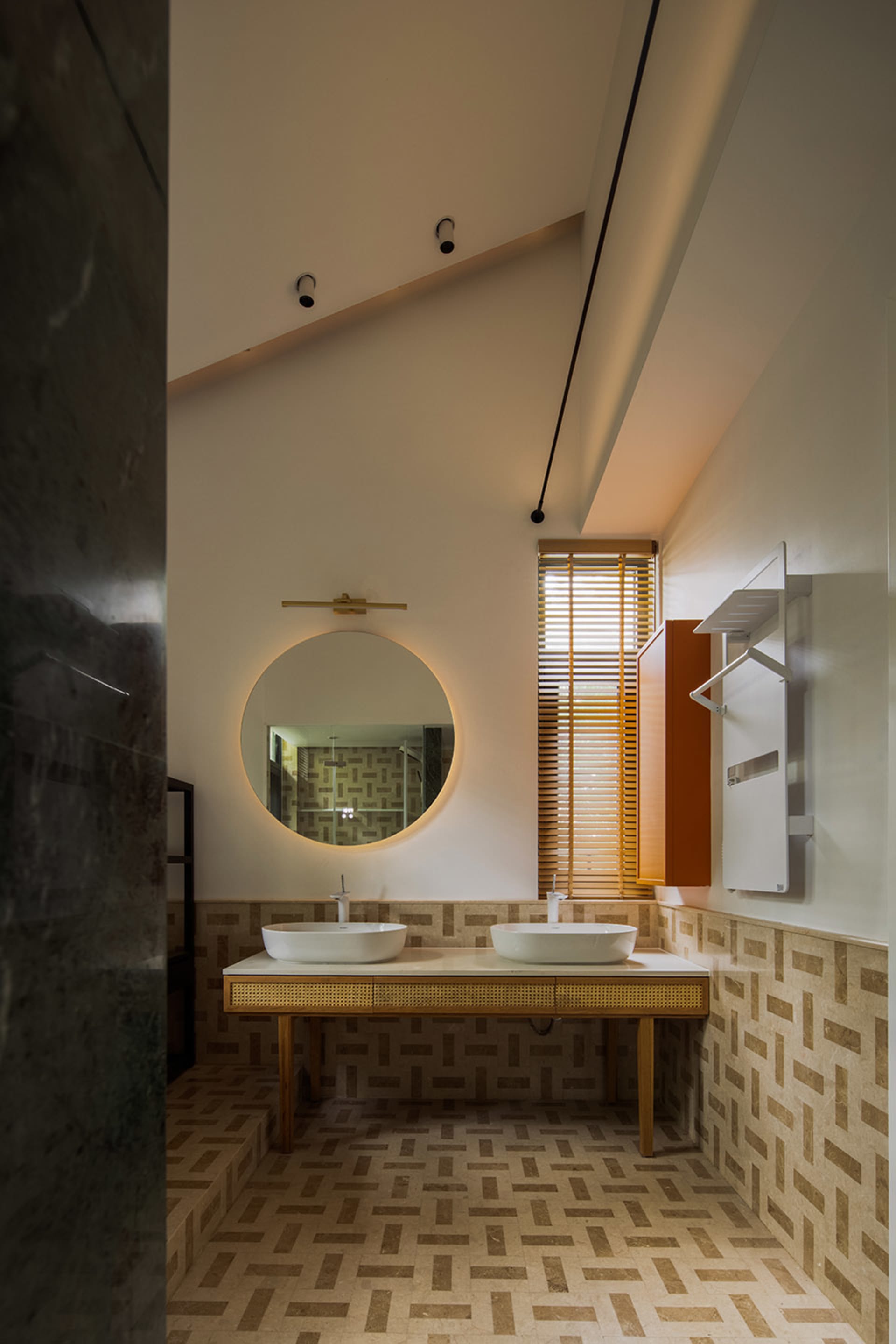 Modern bathroom featuring ceramic tiles with a geometric pattern