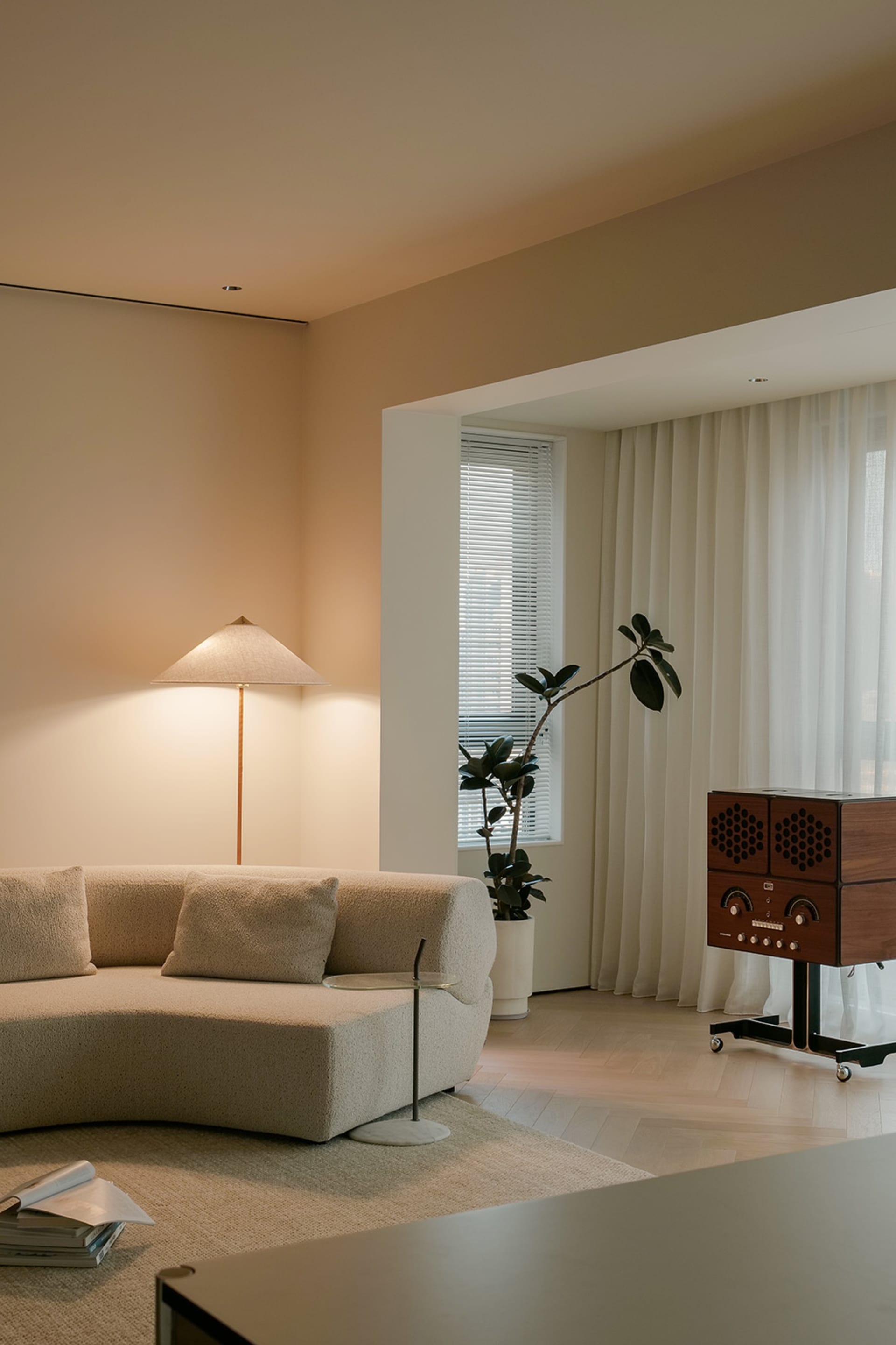 Modern living room with neutral-toned furniture and decor.