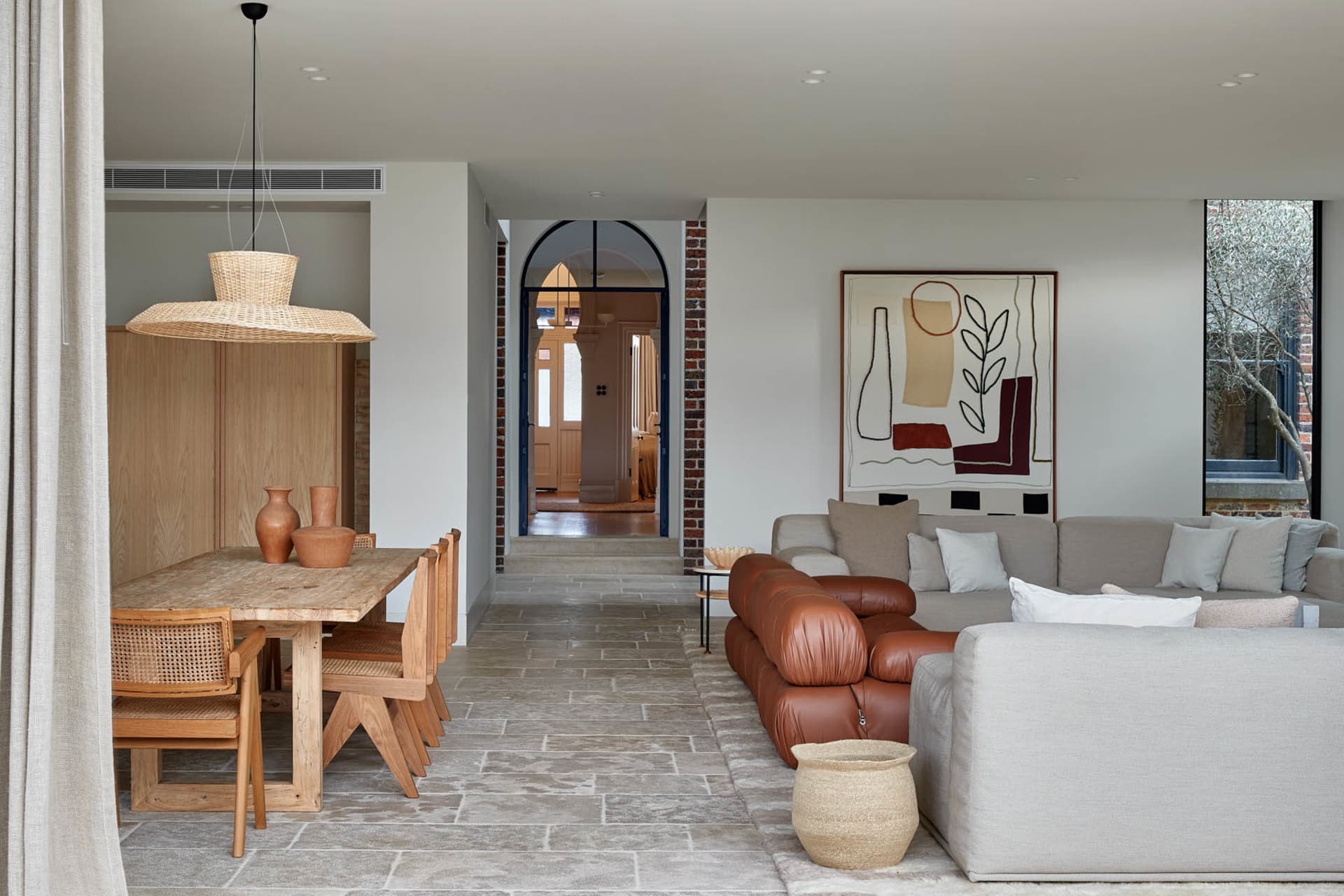 Interior design of a modern living room with wooden and concrete materials