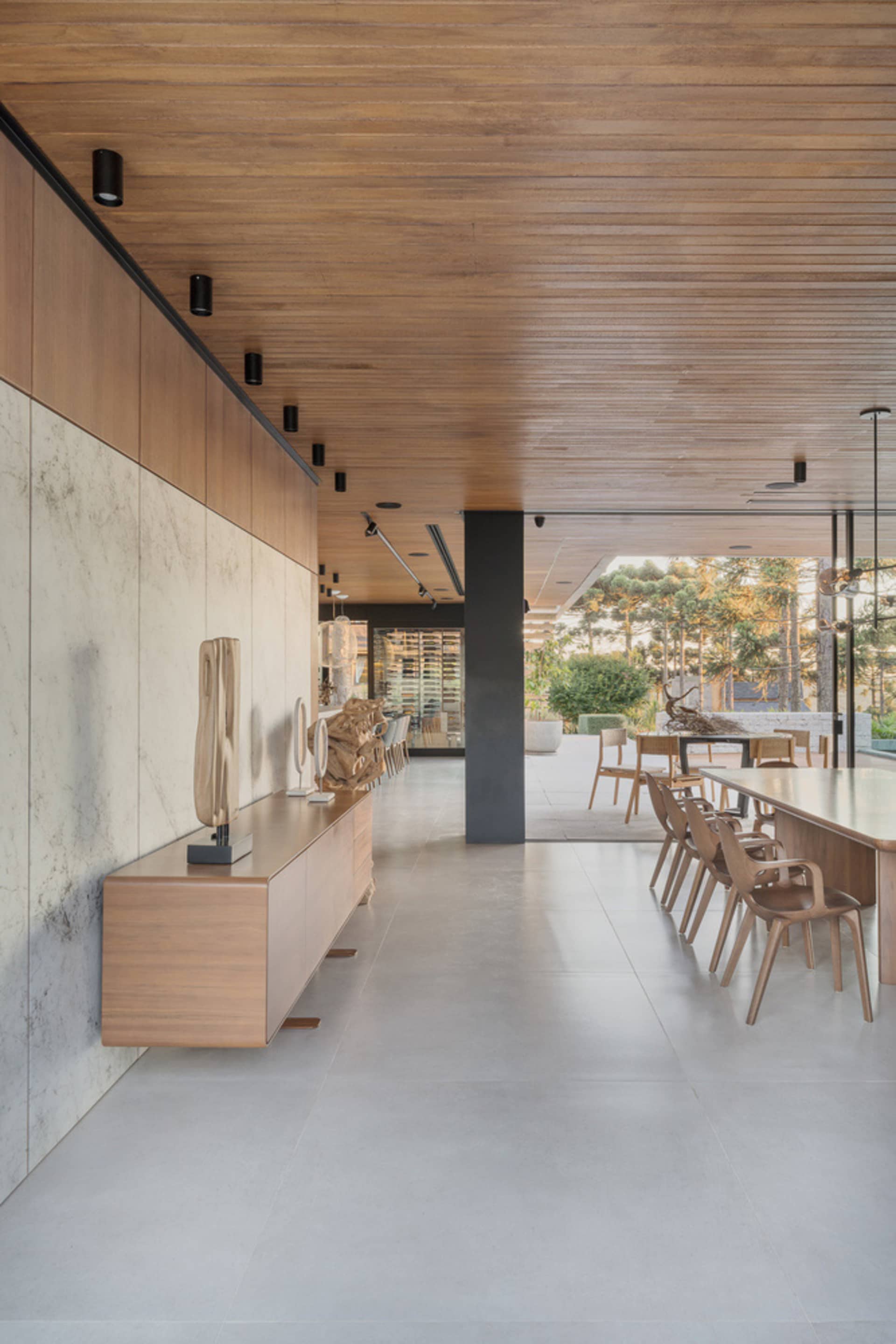 Modern commercial space featuring wooden and concrete elements