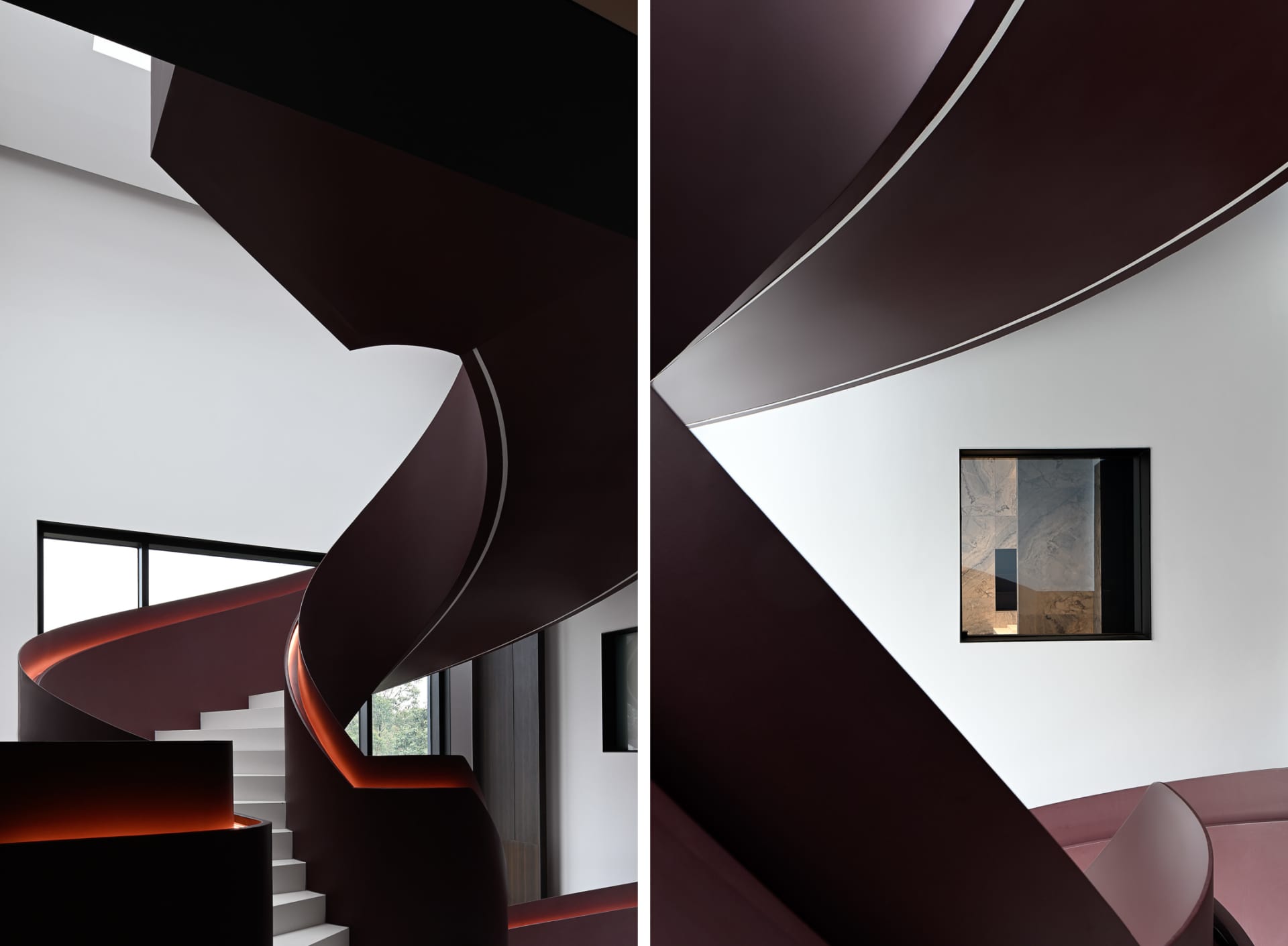 Modern, minimalist staircase with a metallic wrap design and warm lighting.