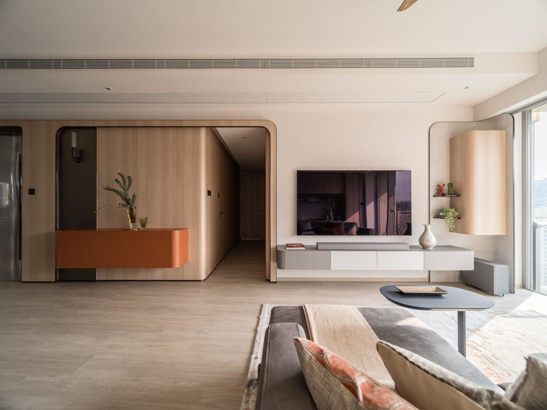 Modern living room featuring wooden walls and furniture