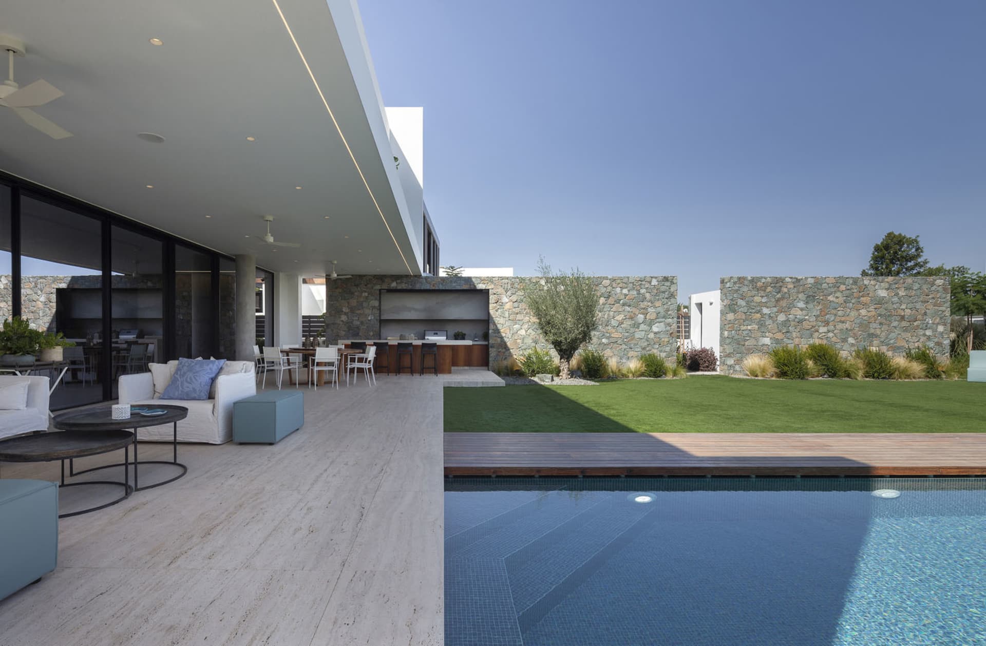 Modern architectural interior with concrete and stone materials.